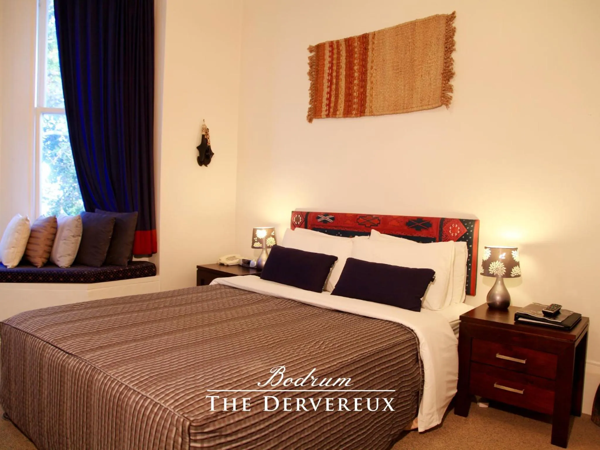 Bed in The Devereux Boutique Hotel