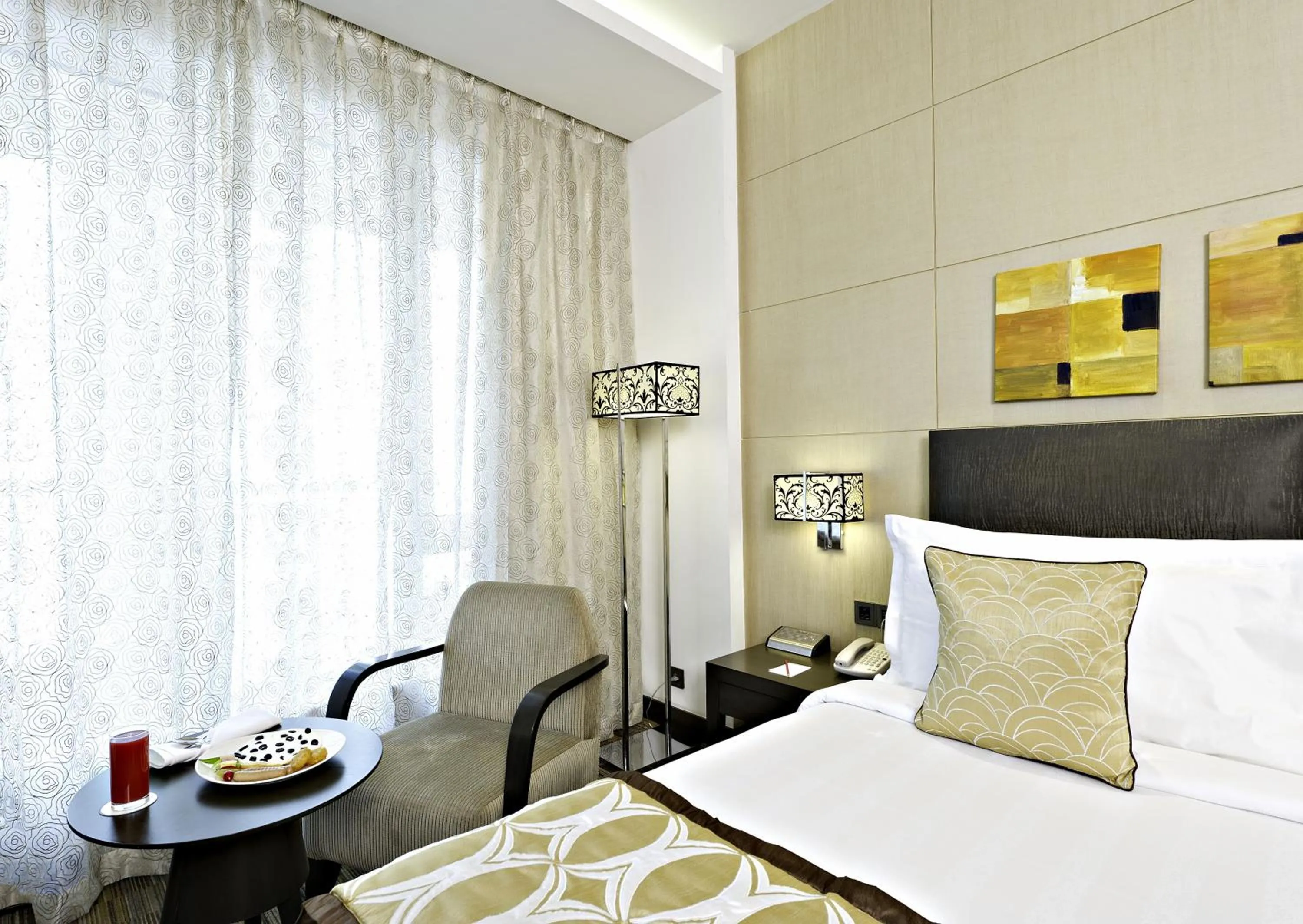 Seating area, Bed in Meluha - The Fern