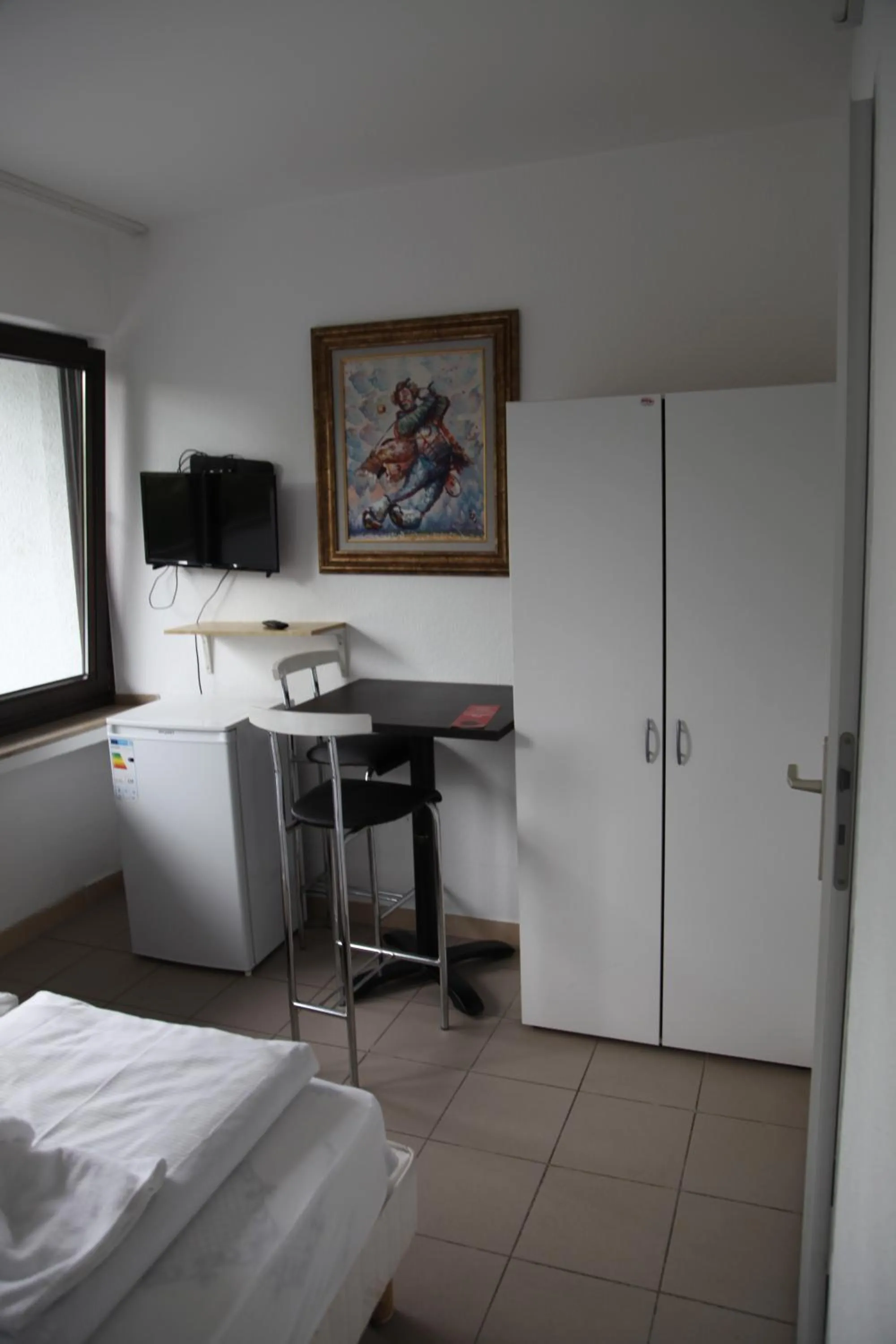 Bed in Hotel Landhaus Köln