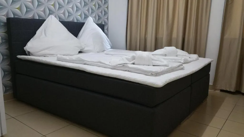 Bed in Hotel Landhaus Köln