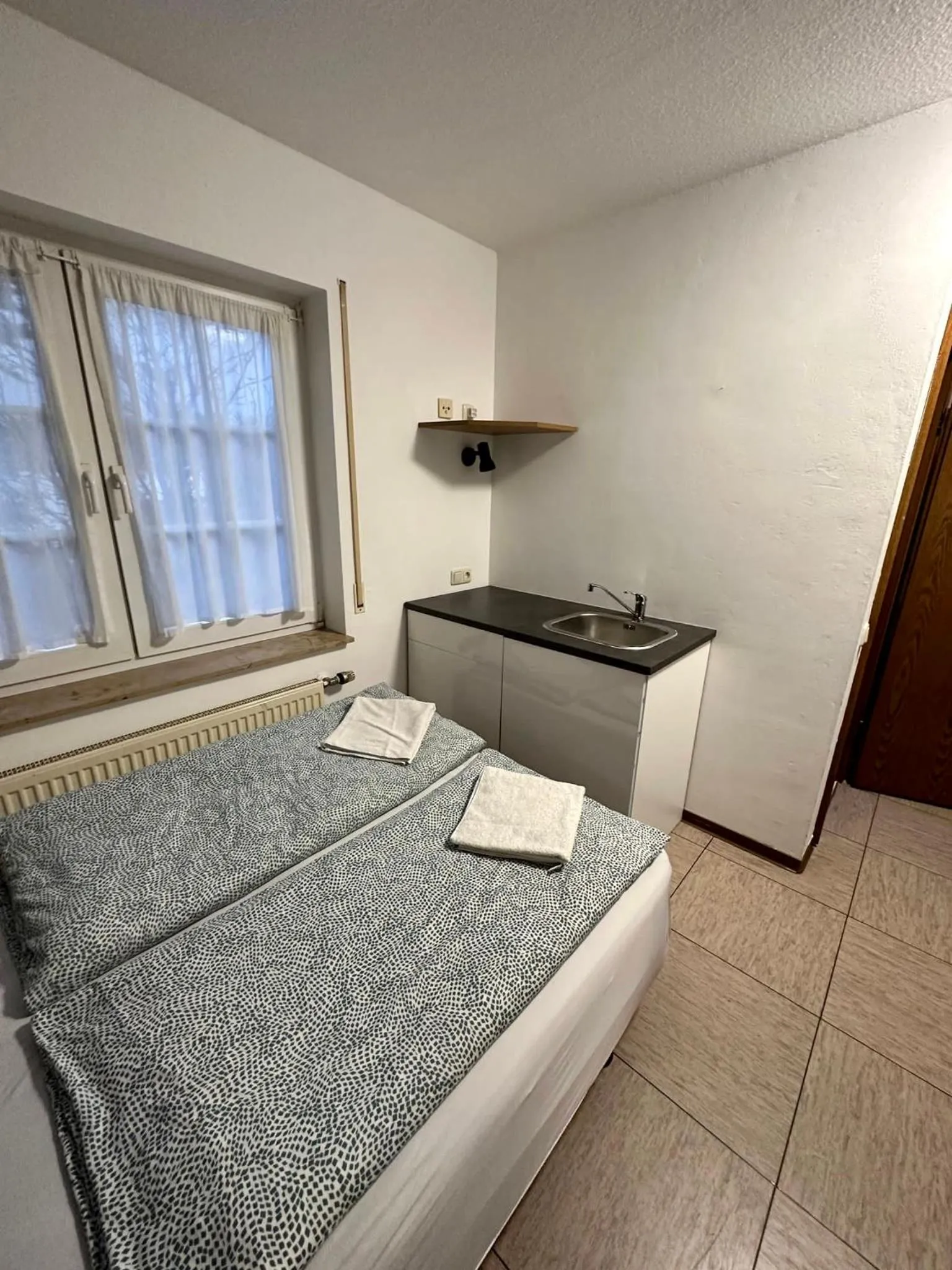 Bed in Hotel Landhaus Köln