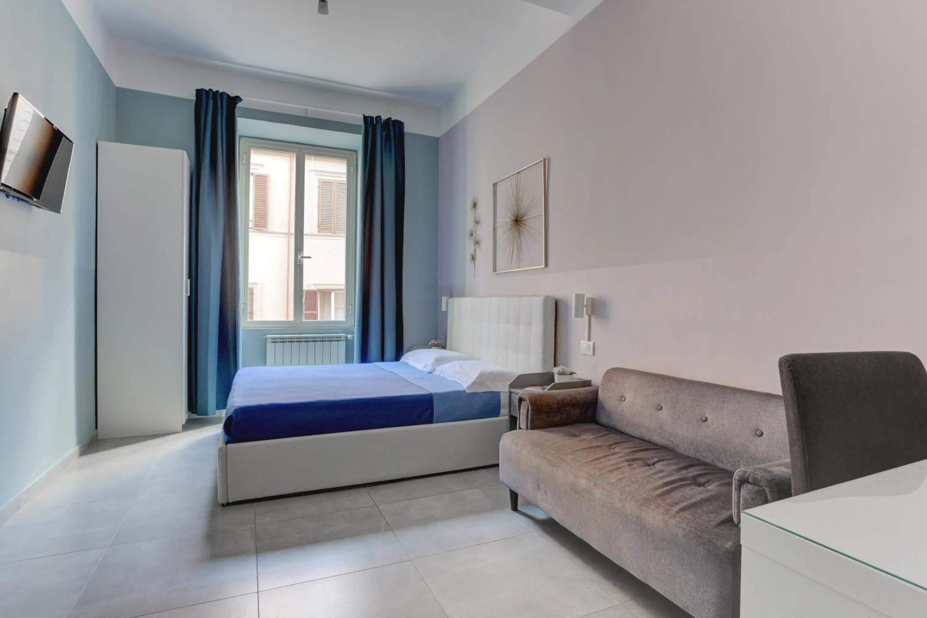 Bed in Claudia House Roma Termini