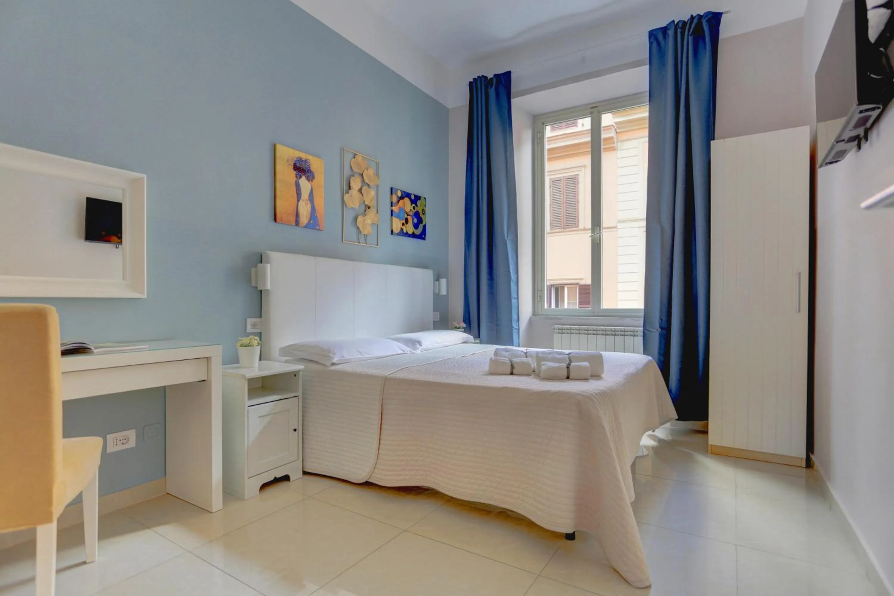 Bed in Claudia House Roma Termini