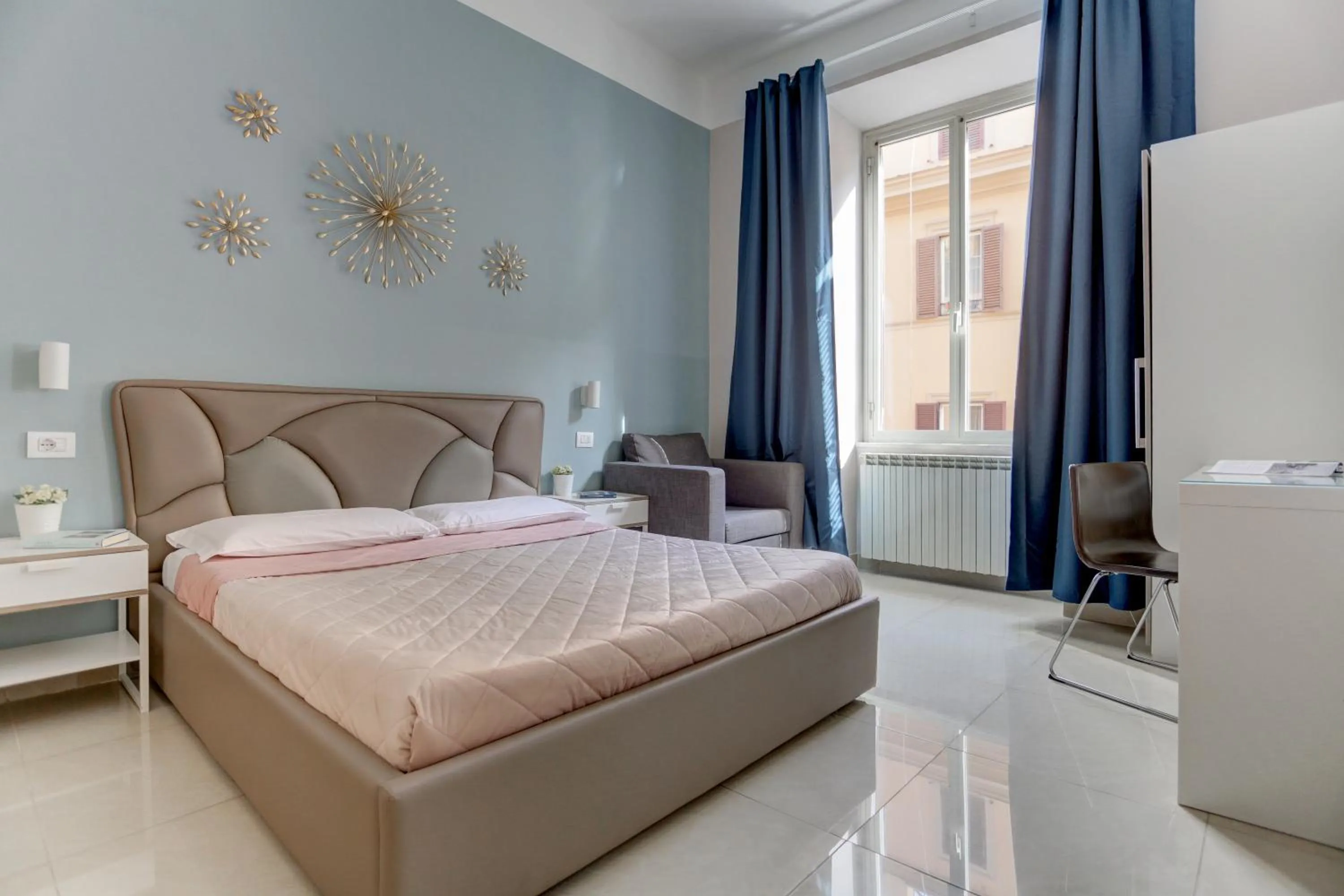 Bed in Claudia House Roma Termini
