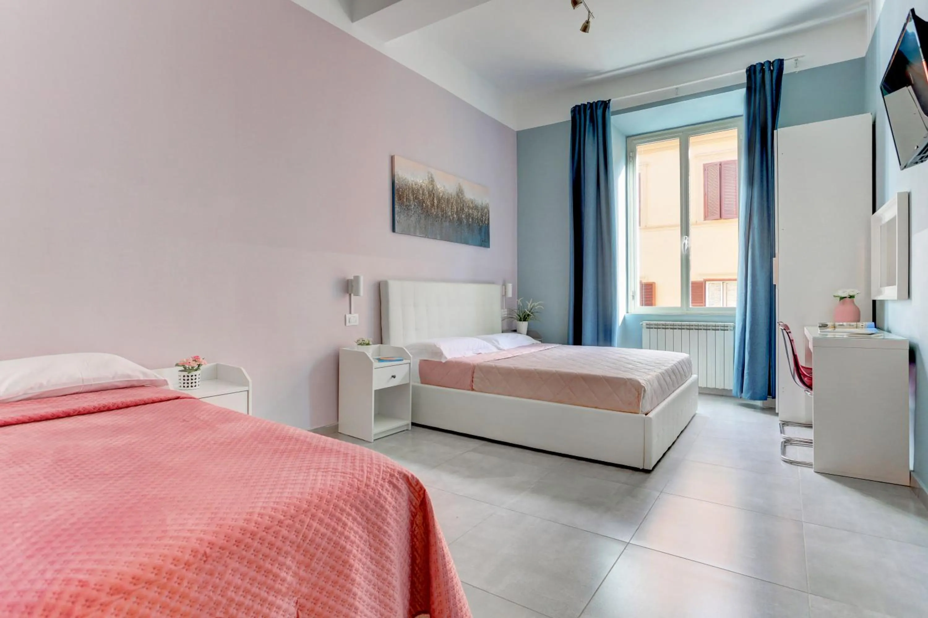 Bed in Claudia House Roma Termini