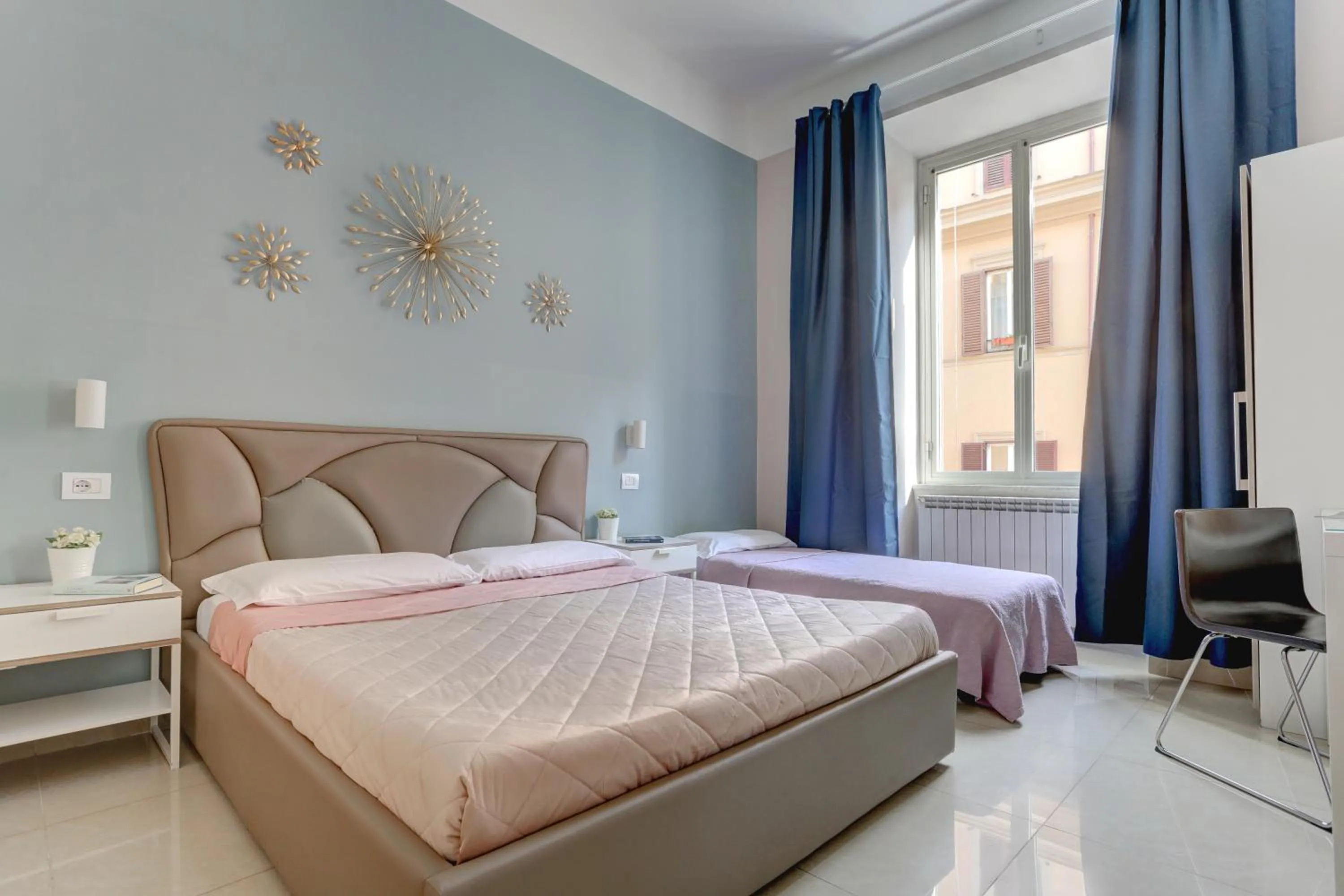 Bed in Claudia House Roma Termini