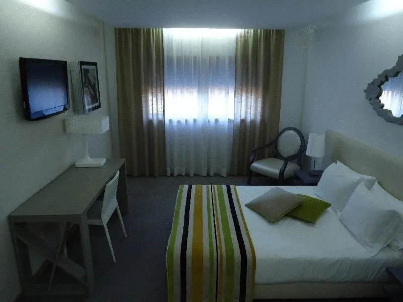 Bed in Paredes Design Hotel