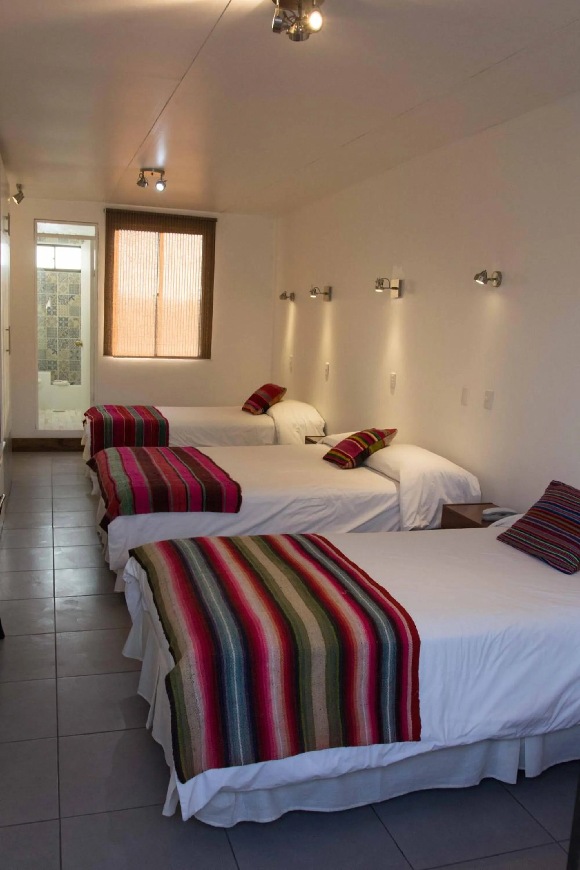 Bedroom, Bed in Hotel Avenida en Arica