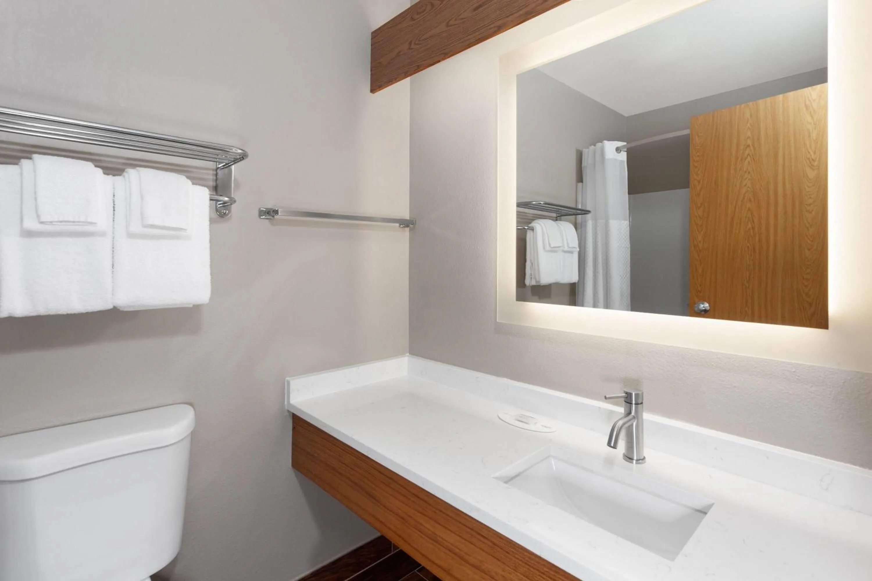 Bathroom in Super 8 by Wyndham Green Bay Near Stadium