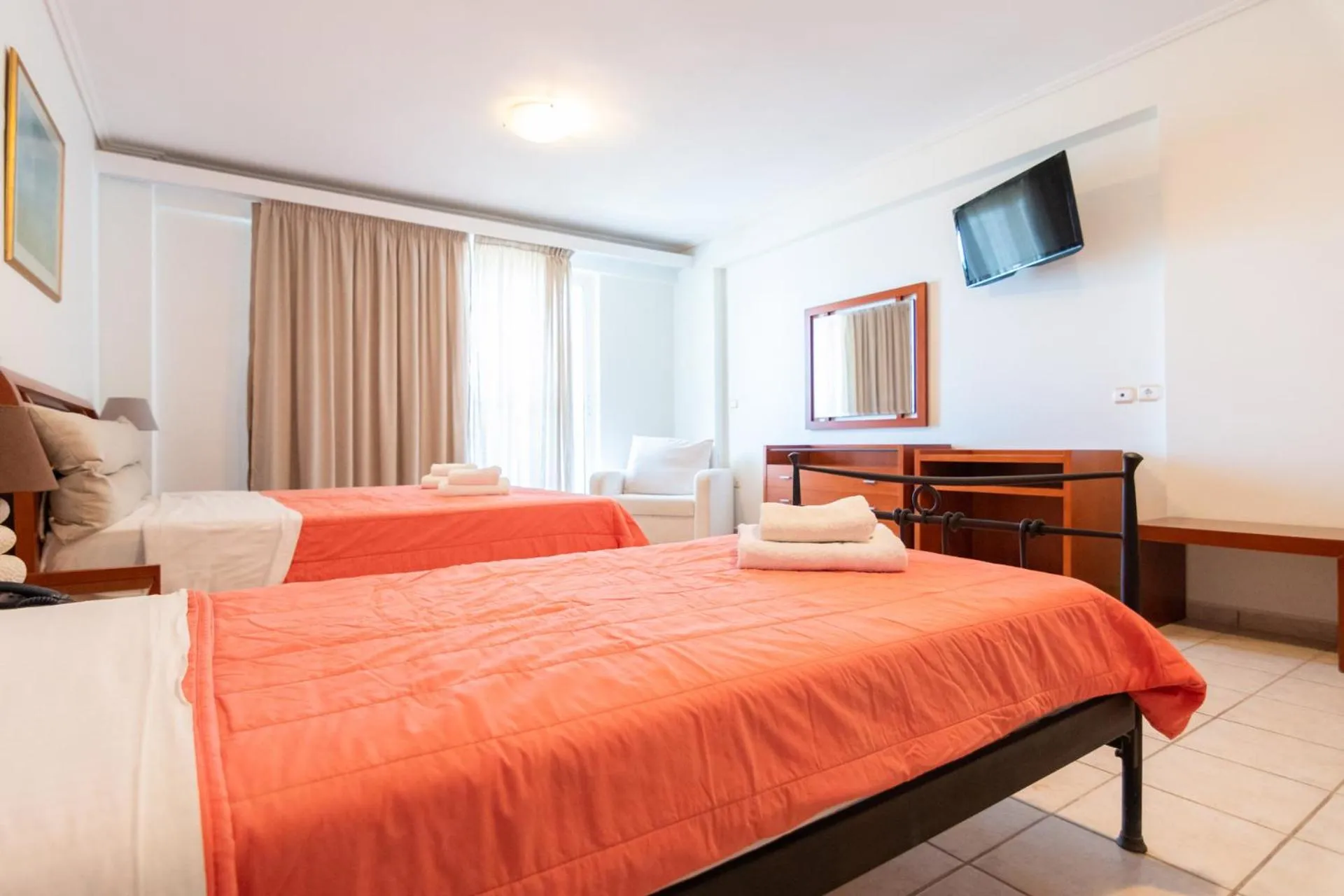 Bed in Hotel Grand Nefeli