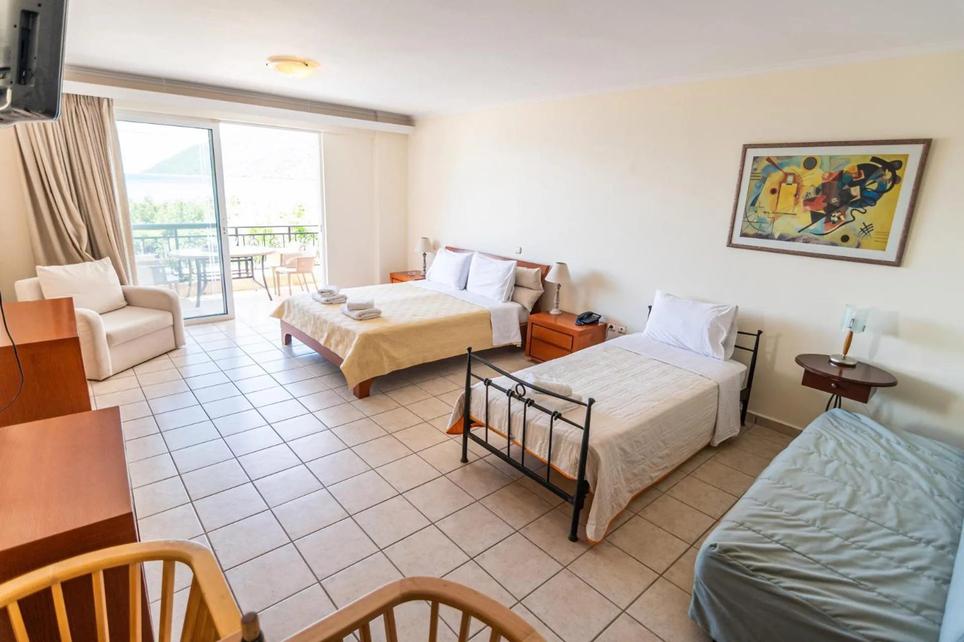 Bed in Hotel Grand Nefeli