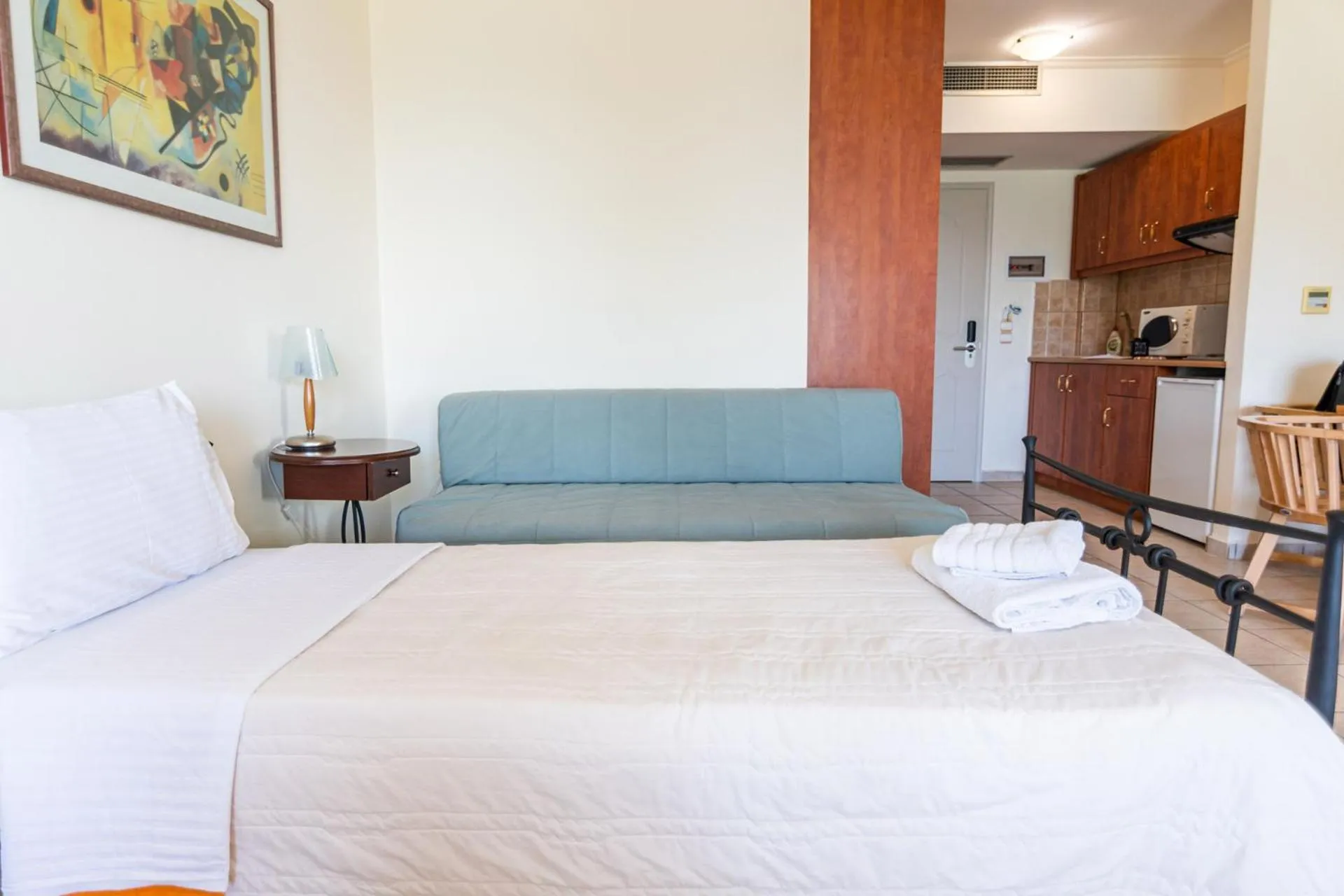 Bed in Hotel Grand Nefeli