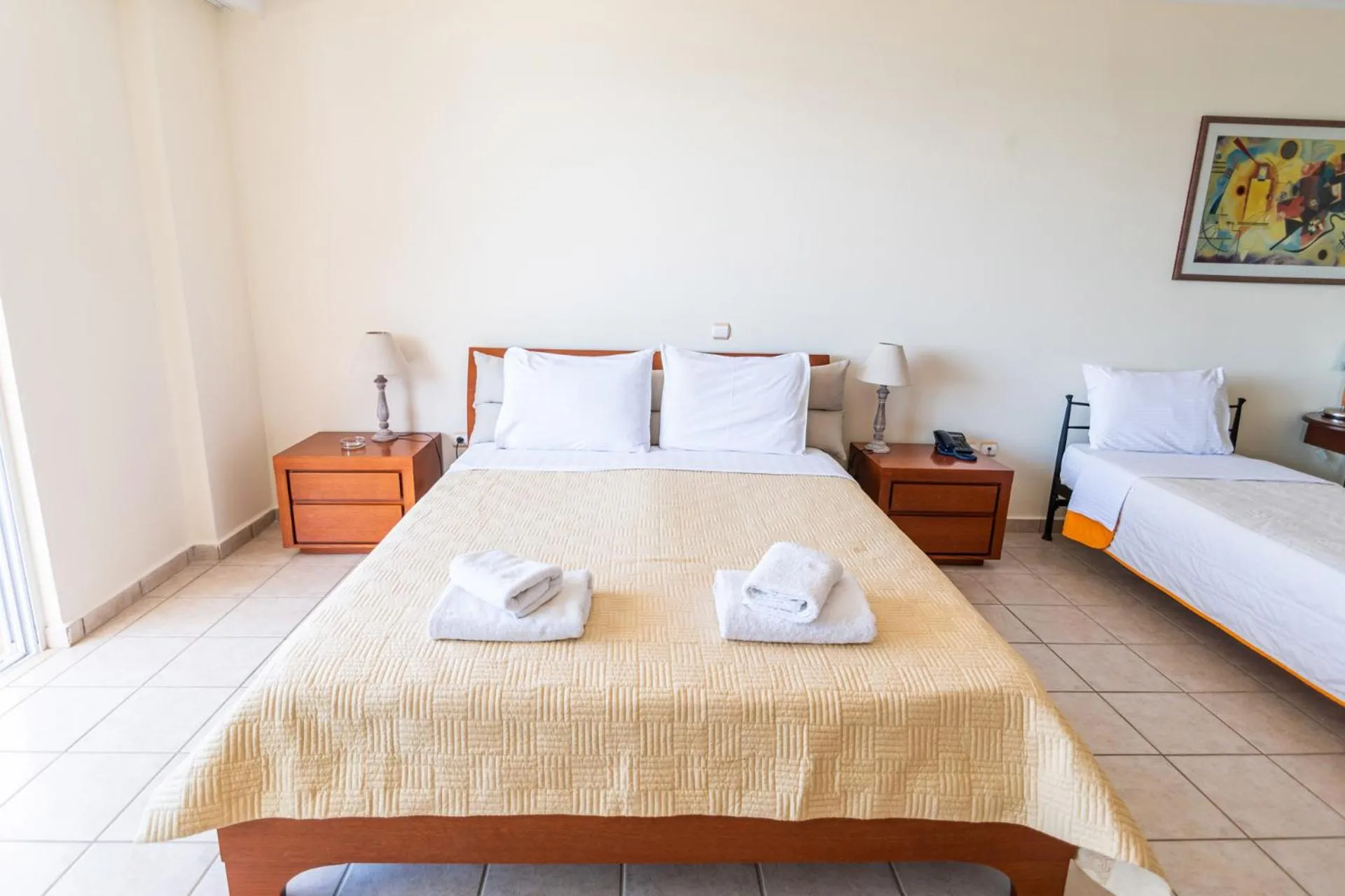 Bed in Hotel Grand Nefeli