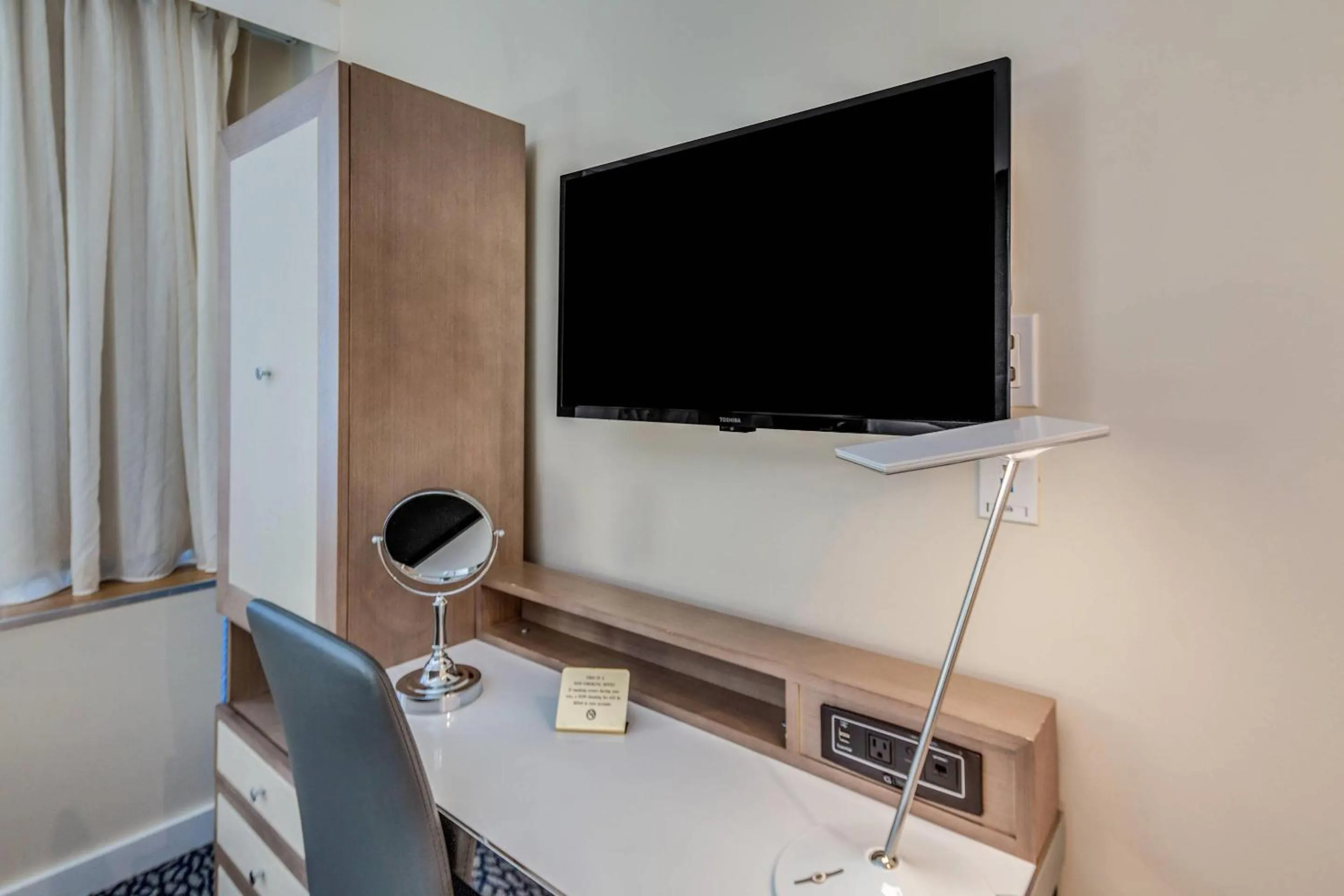 Bedroom in The Historic Blue Angel Hotel Lexington Ave, an Ascend Collection
