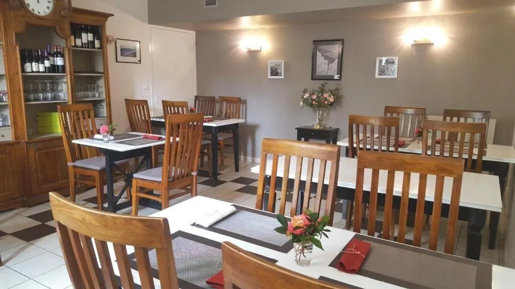 Dining area in Logis Auberge de Carolles