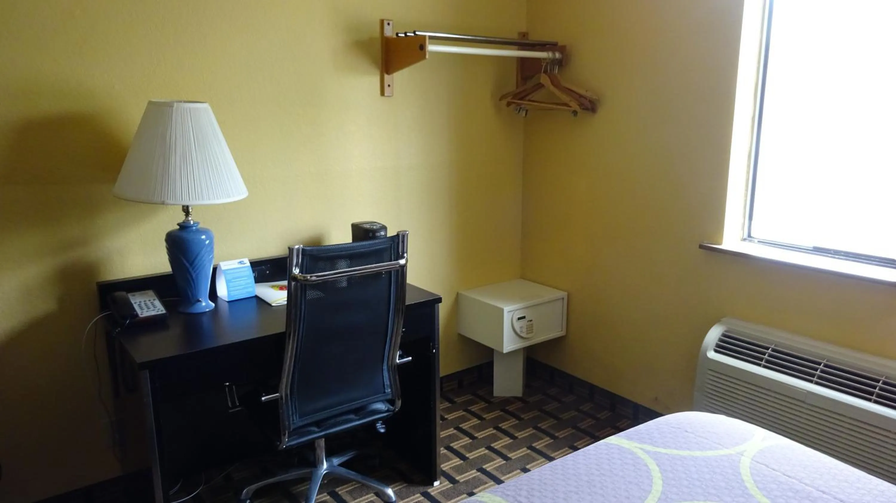 Decorative detail, Bed in Super 8 by Wyndham Terre Haute