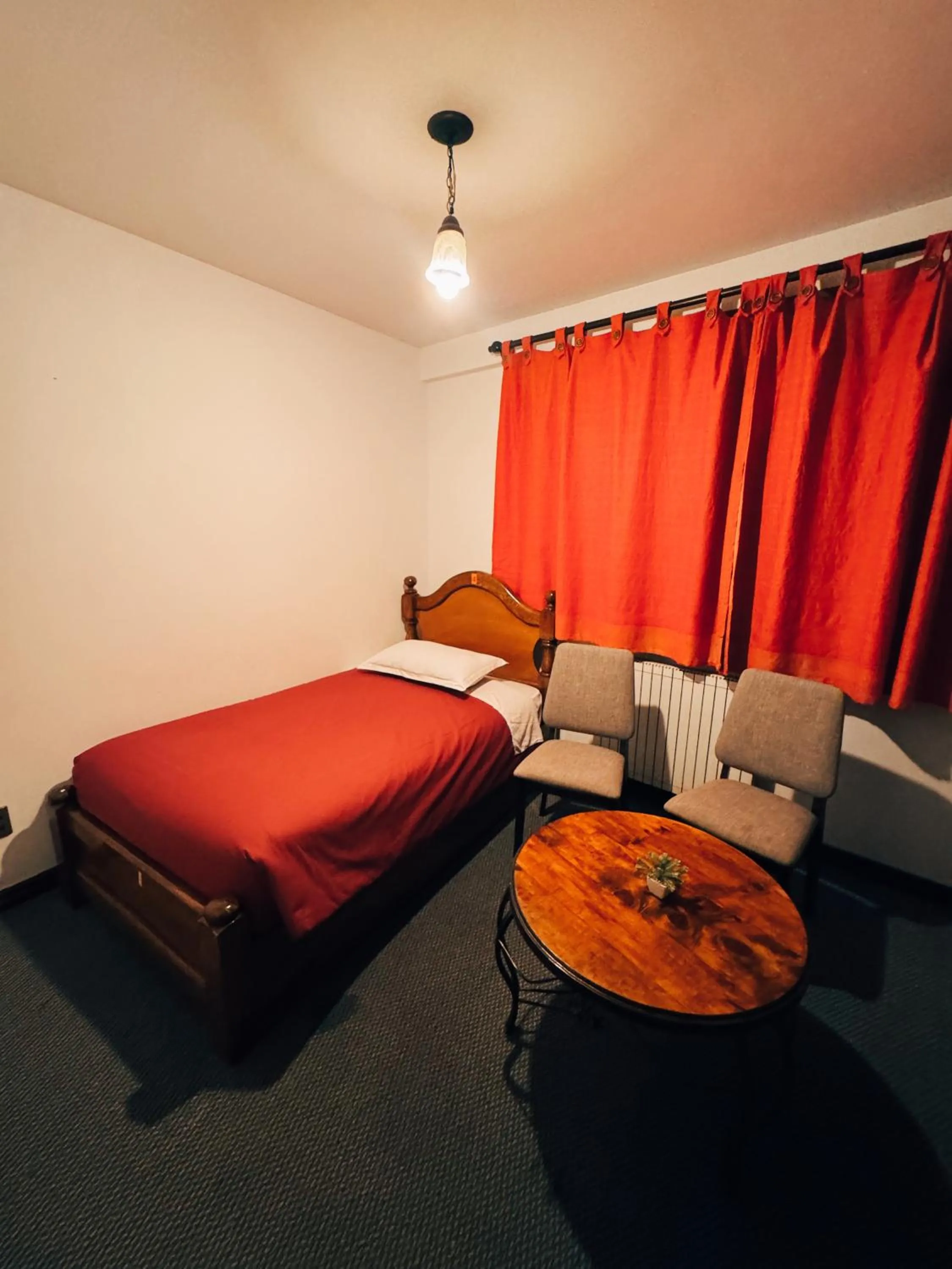 Photo of the whole room, Bed in Inca's Room