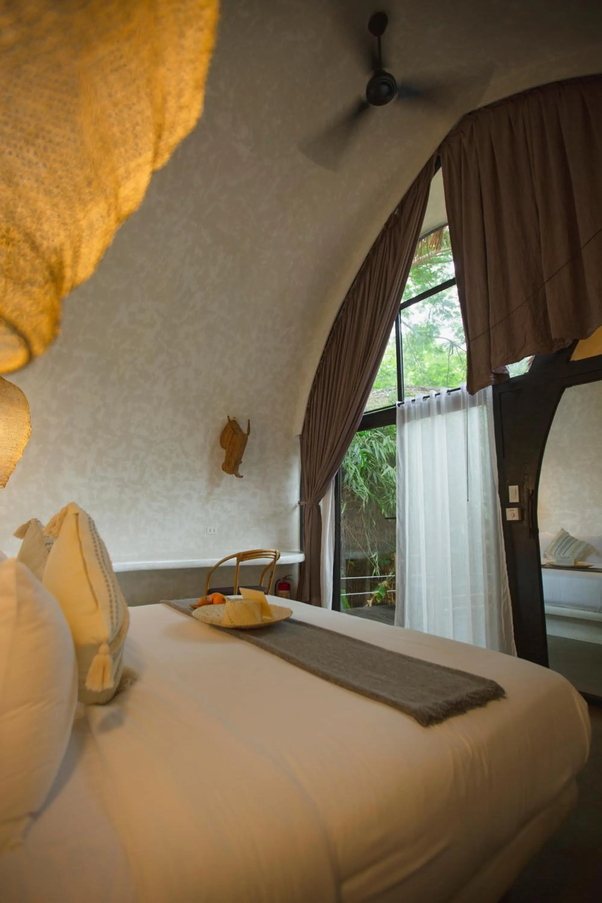 Bed in Panorama Boutique Hotel & Beach Club