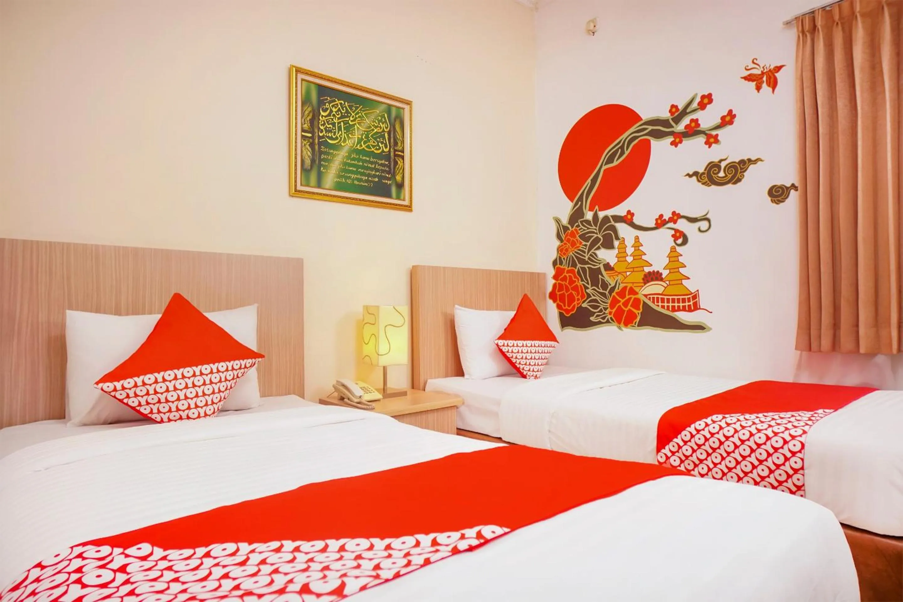 Bedroom in Capital O 142 Hotel Al Furqon Syariah