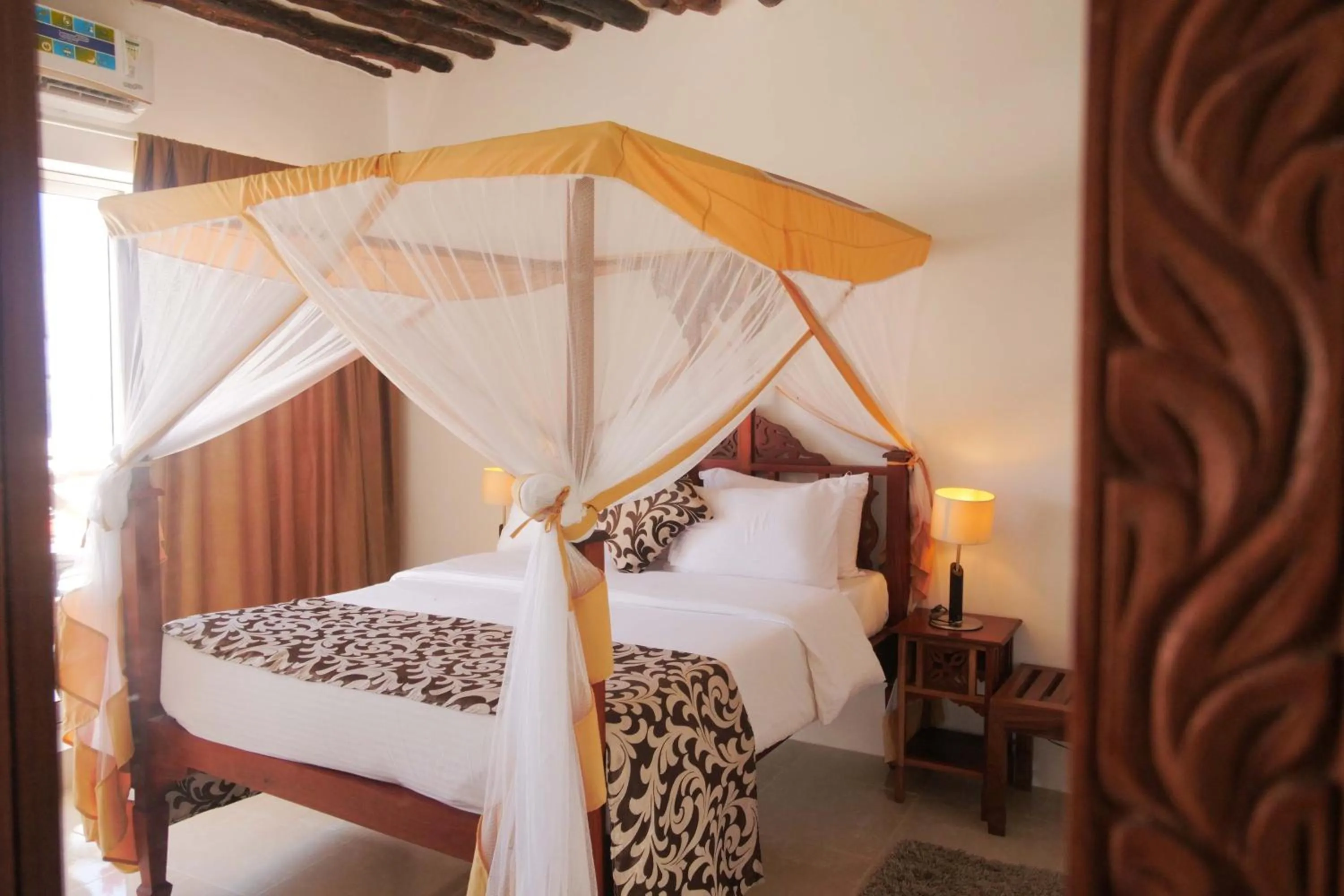 Bed in Isla Bonita Zanzibar Beach Resort