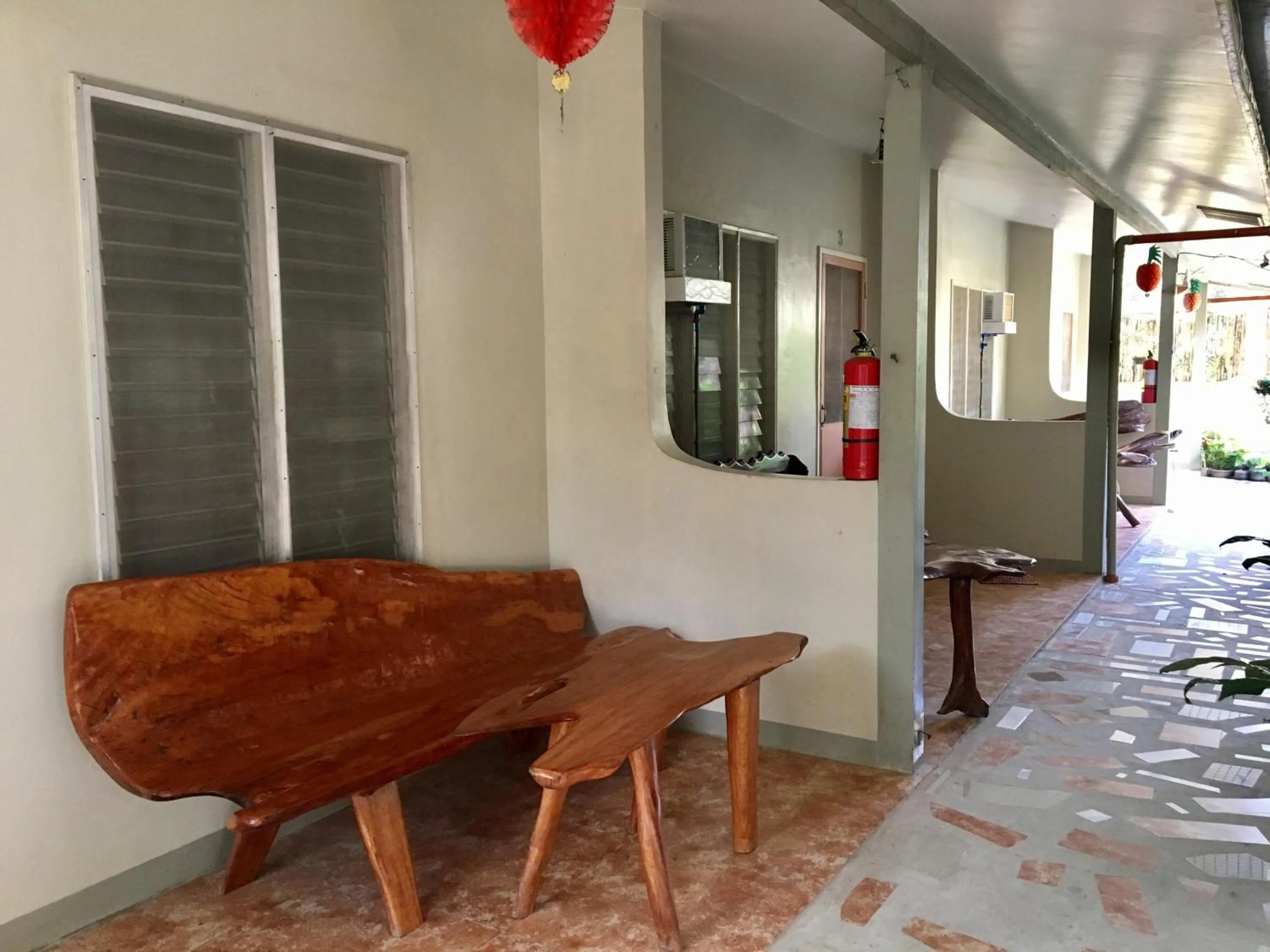 Seating area in Pisces Tourist Inn - Port Barton