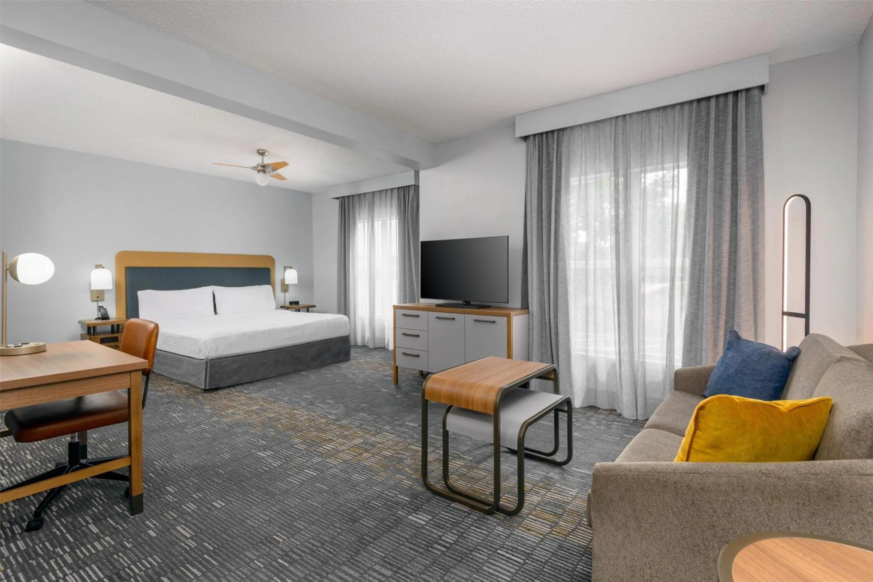 Living room, Bed in Homewood Suites by Hilton Orlando-UCF Area