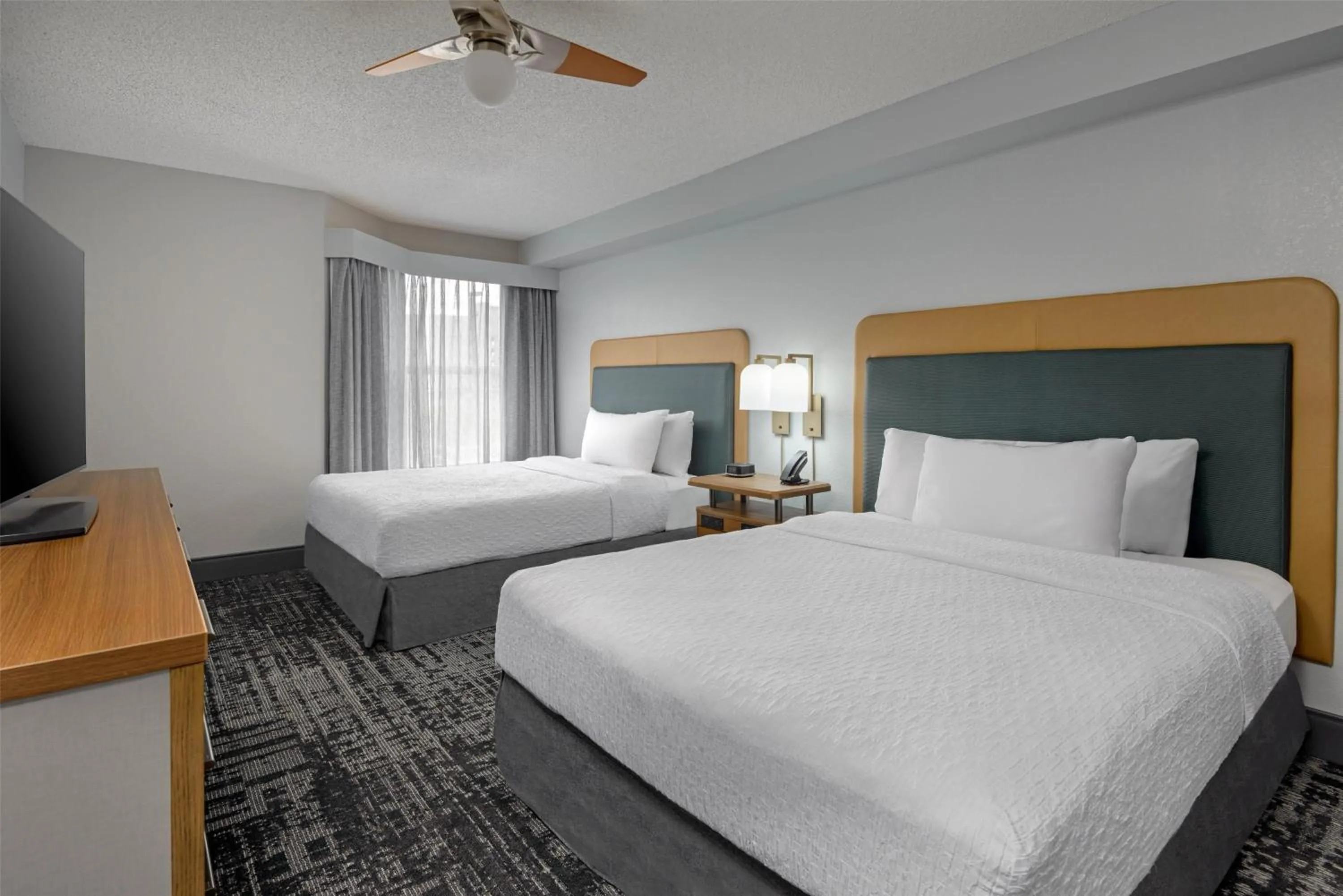 Bed in Homewood Suites by Hilton Orlando-UCF Area