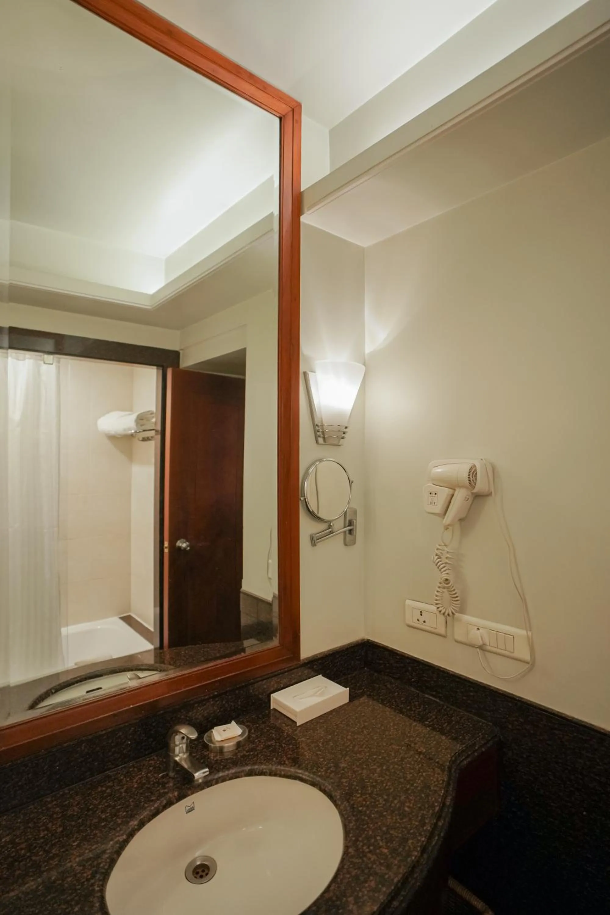 Bathroom in Clarion Bella Casa at Airport