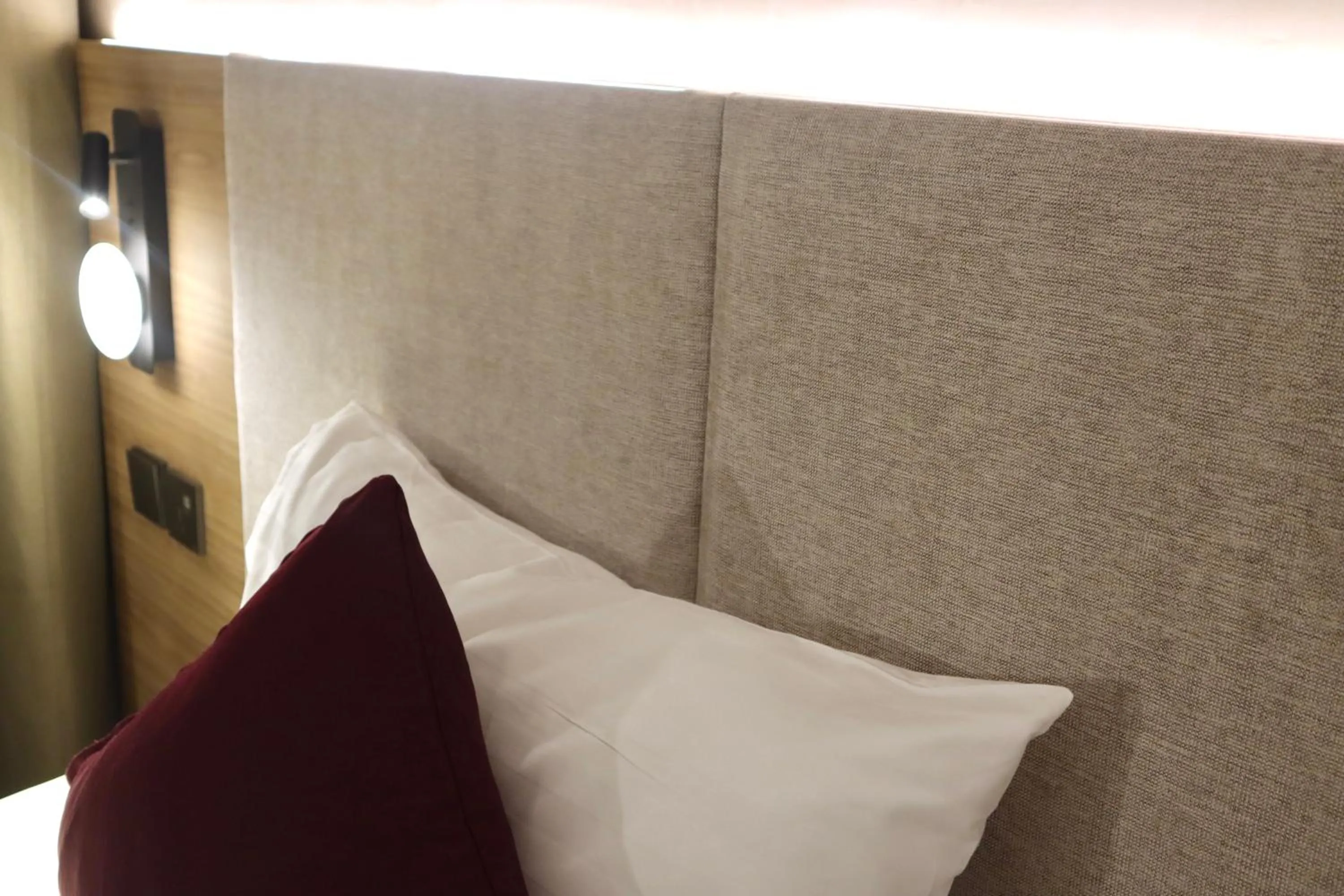 Bed in The Brunei Hotel