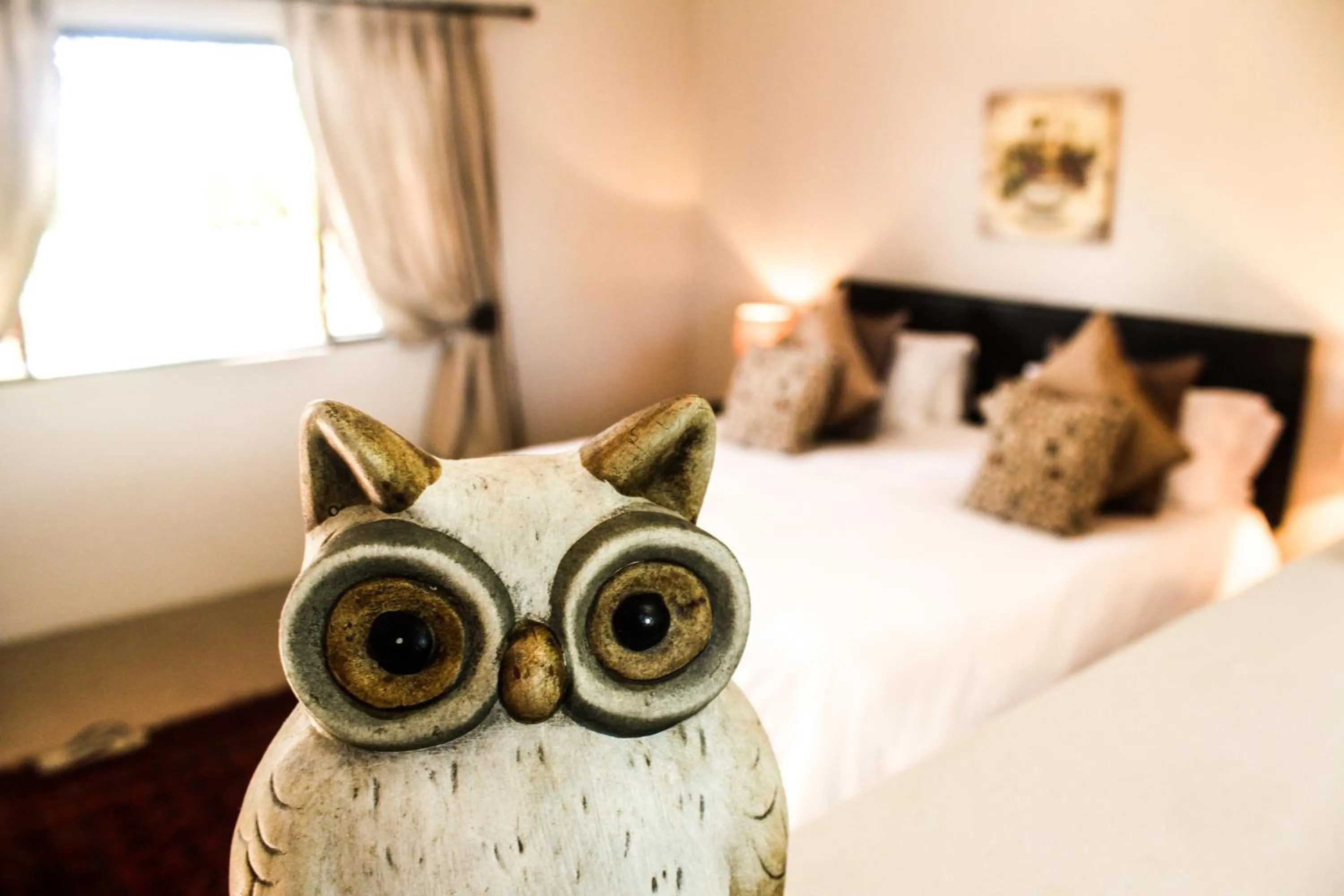 Bed in Gerald's Gift Guest House