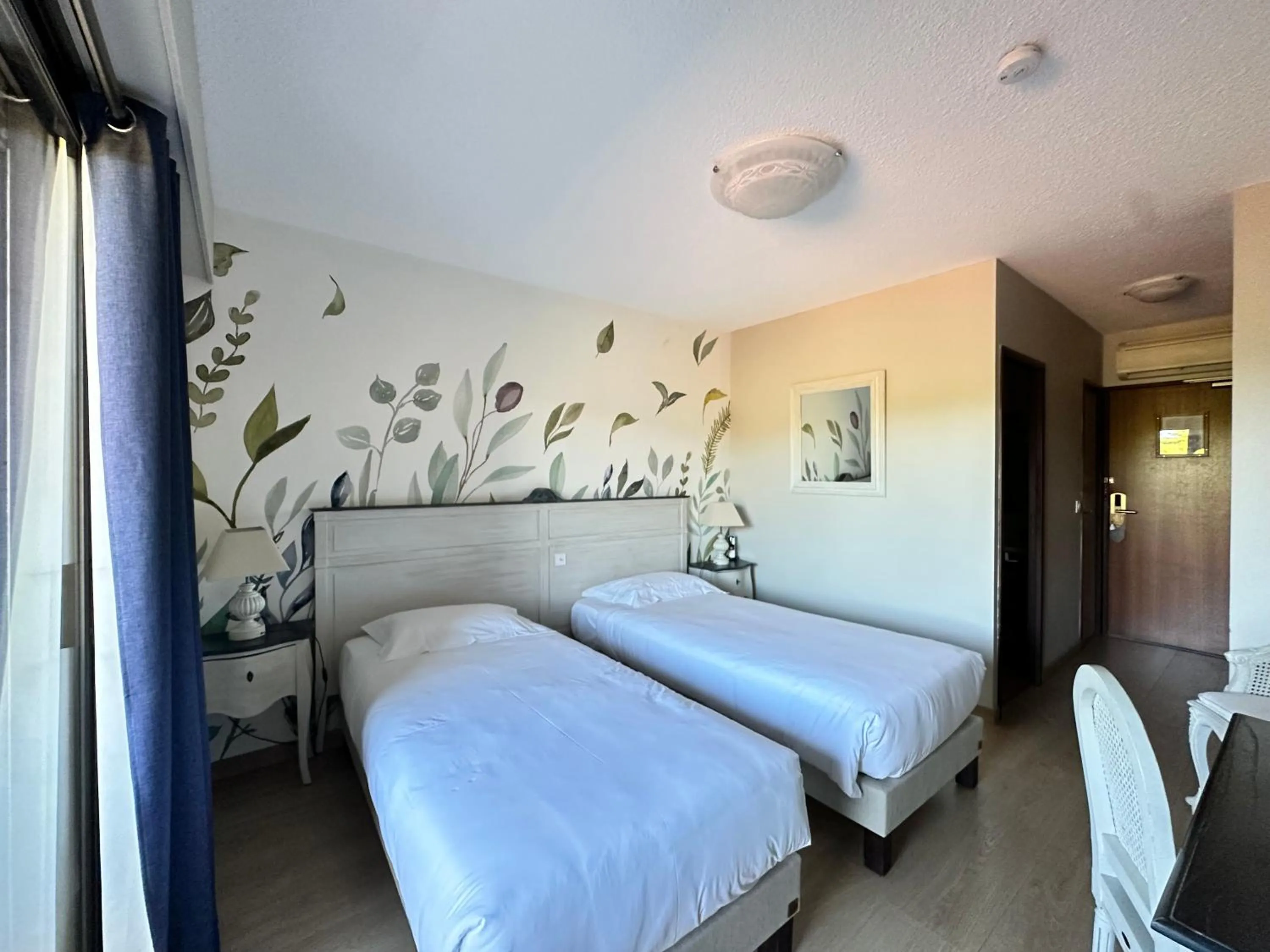 Bed in Hôtel Le Colombier