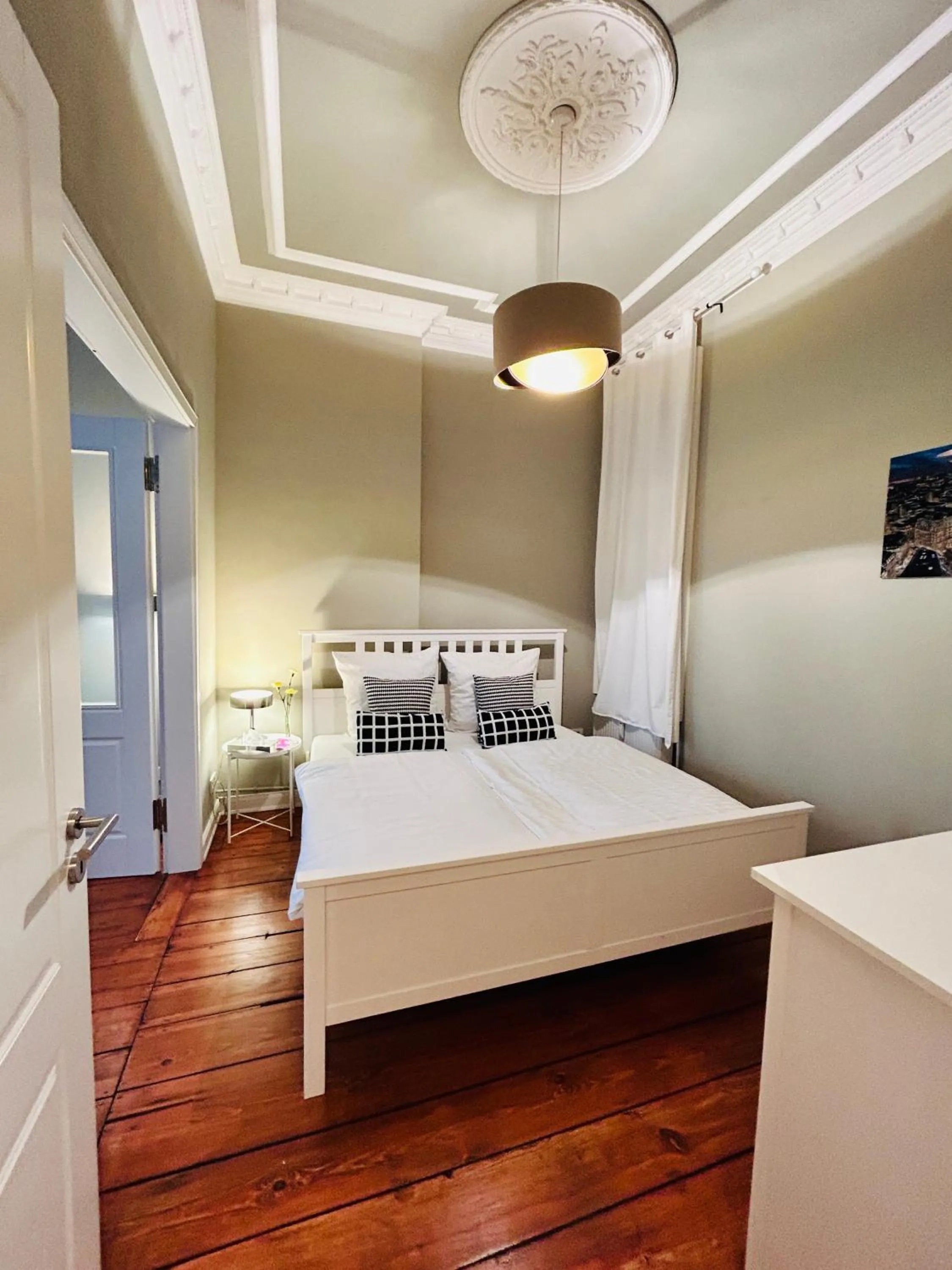 Bed in Blue City Apartment’s