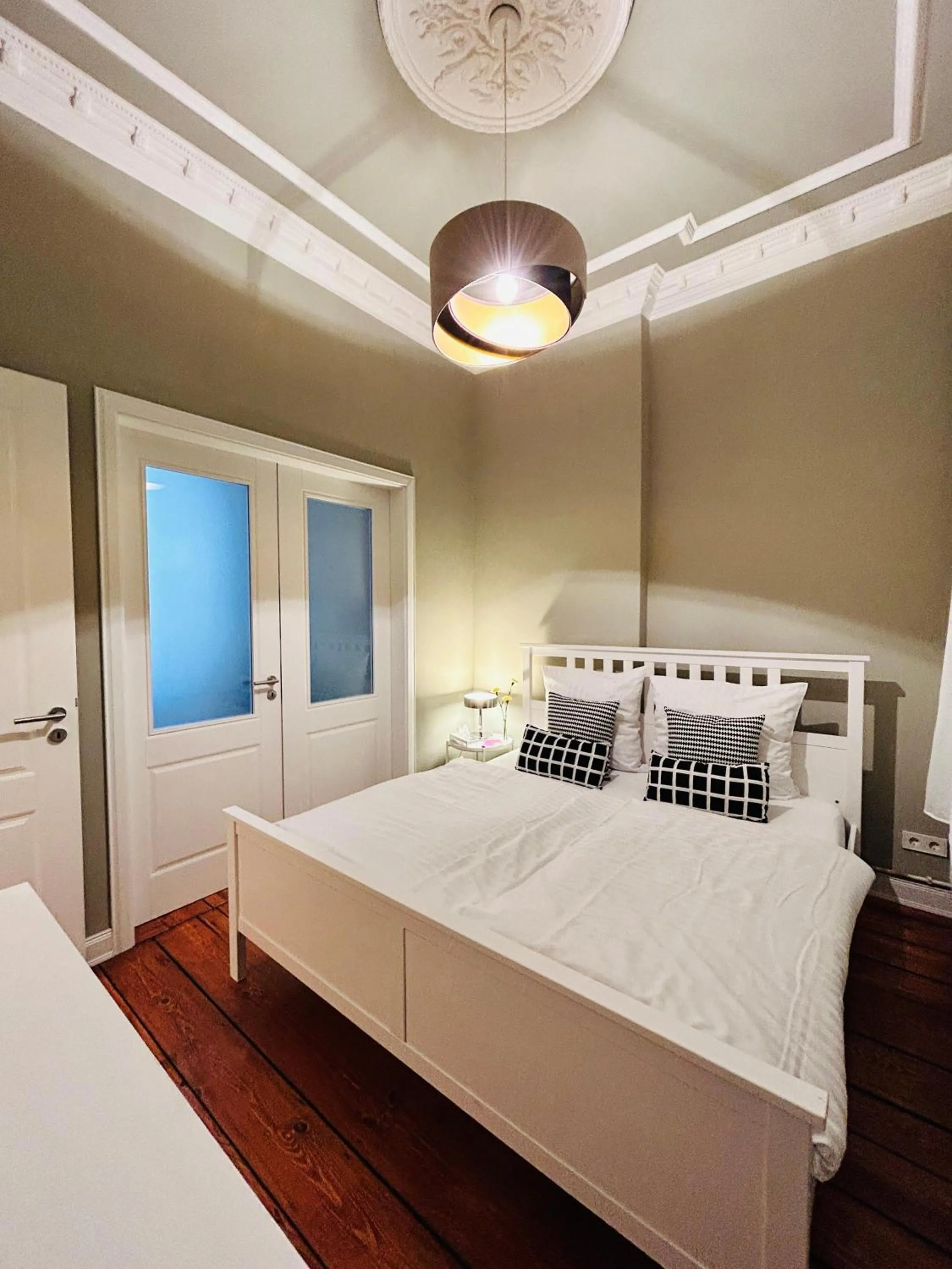 Bed in Blue City Apartment’s