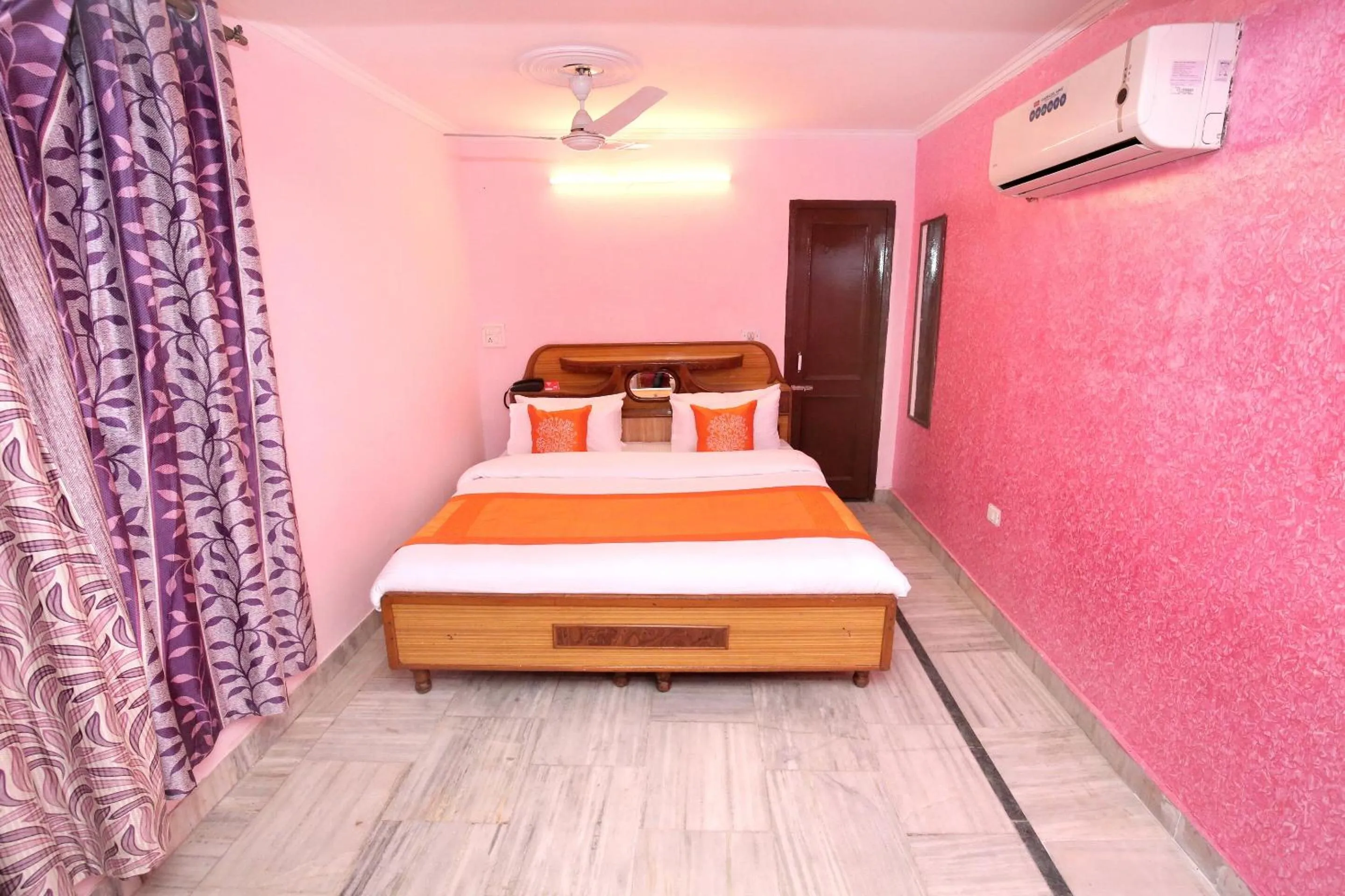 Bedroom in Hotel O Rajesh Palace