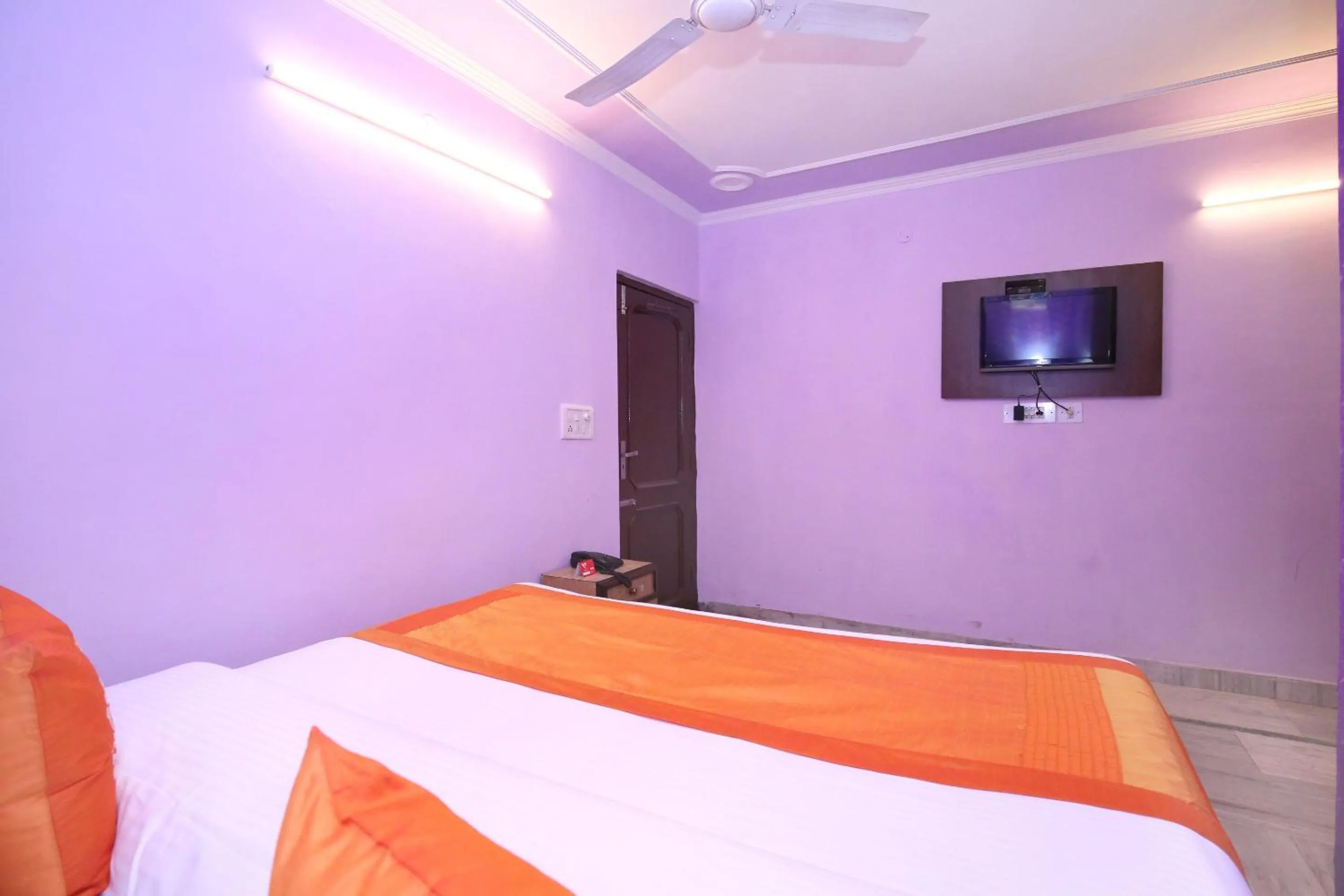 Bedroom in Hotel O Rajesh Palace