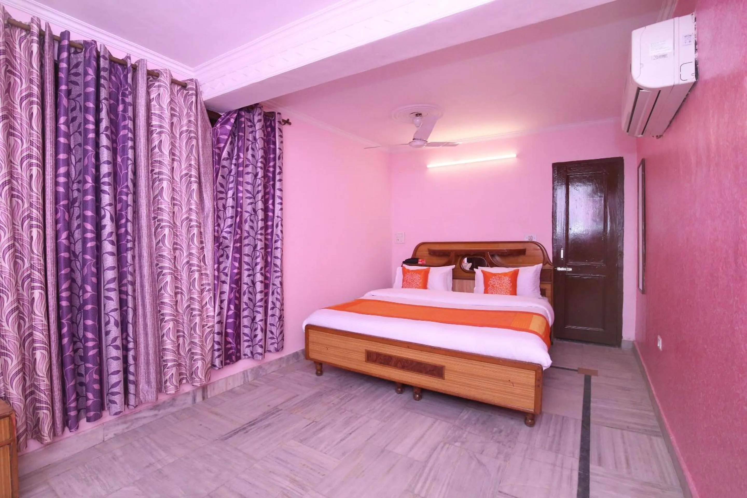 Bedroom in Hotel O Rajesh Palace