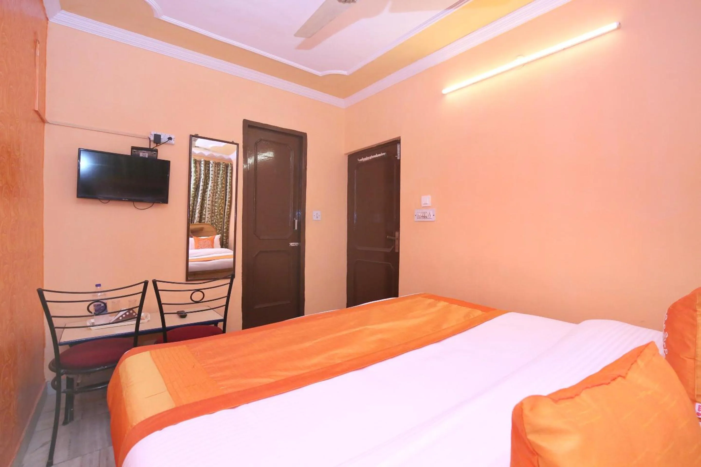 Bedroom in Hotel O Rajesh Palace