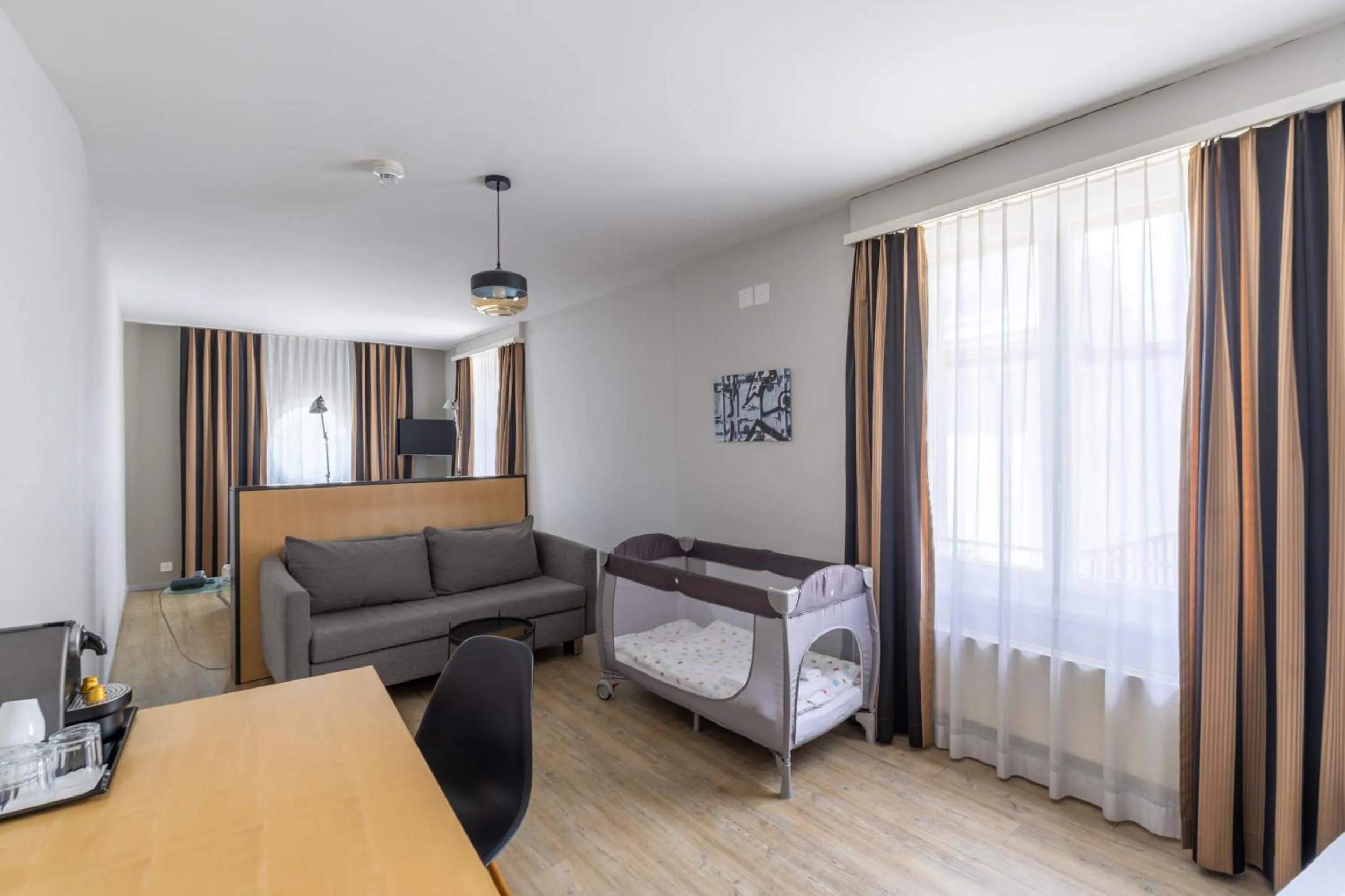 Seating area, Bed in Royal Hotel - Urban Living