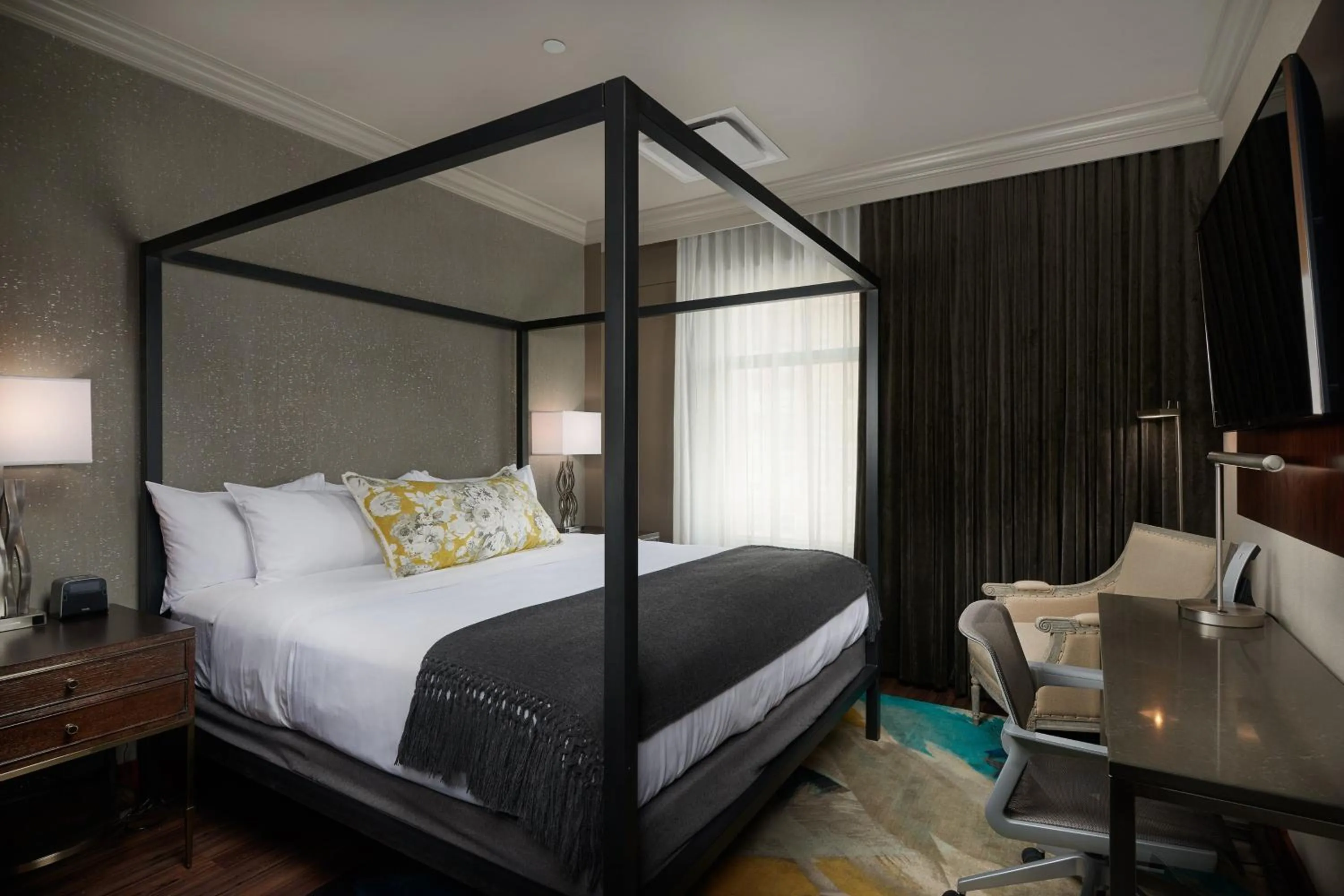 Photo of the whole room, Bed in The Merrill Hotel & Conference Center, Muscatine, a Tribute Portfolio Hotel