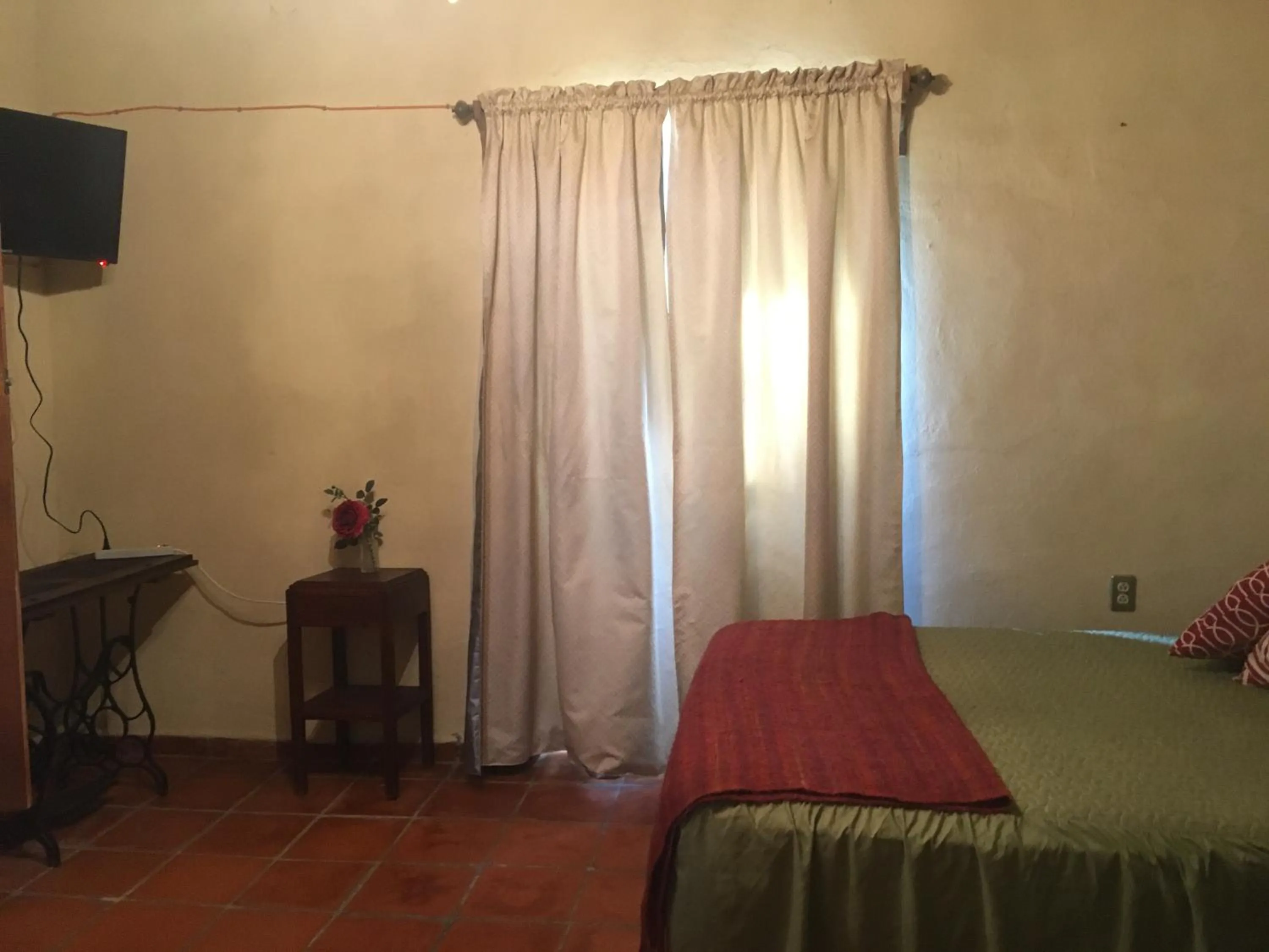 Bed in Hostal Doña Carlota Hotel