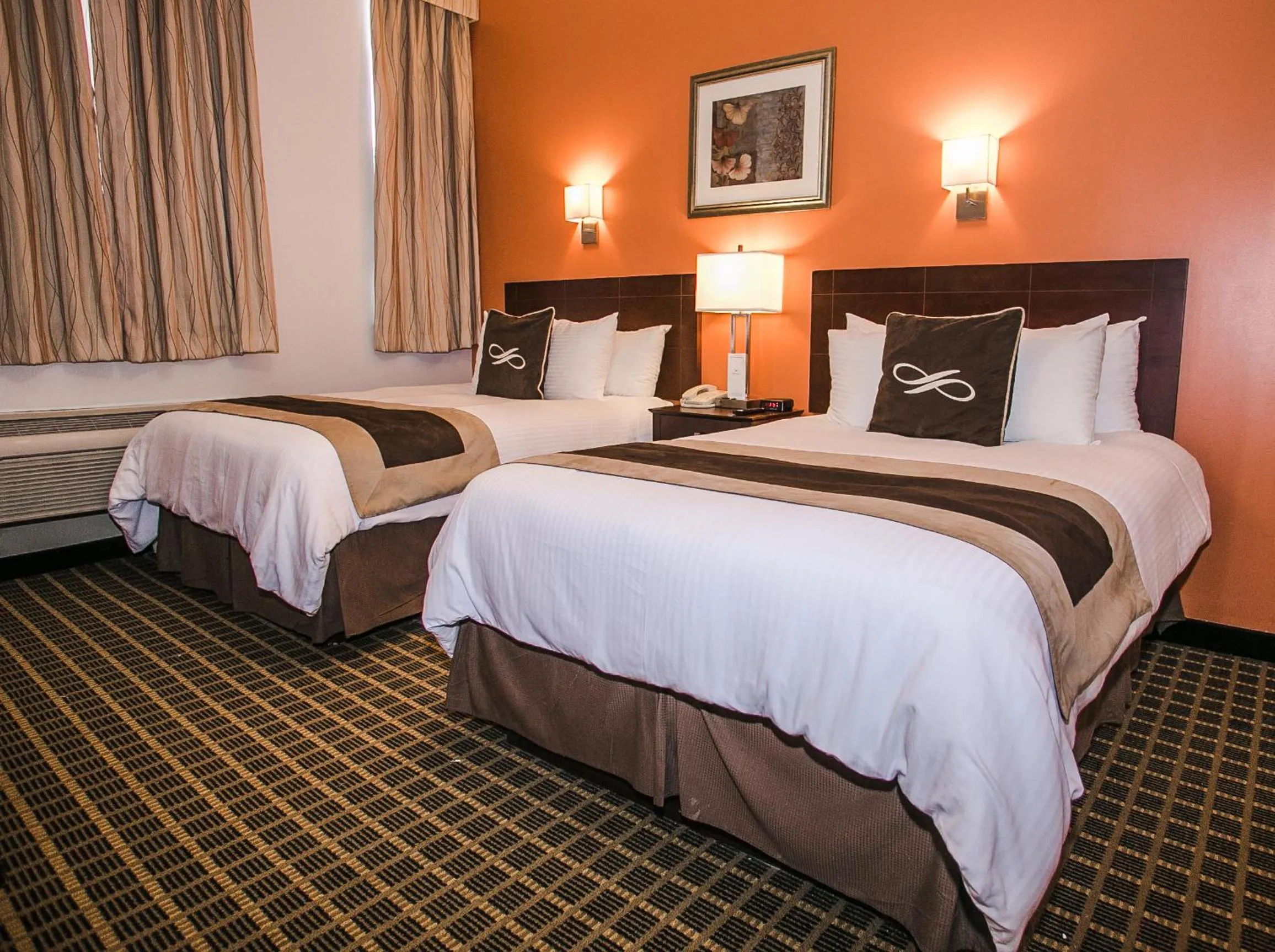 Bed in Pointe Plaza Hotel