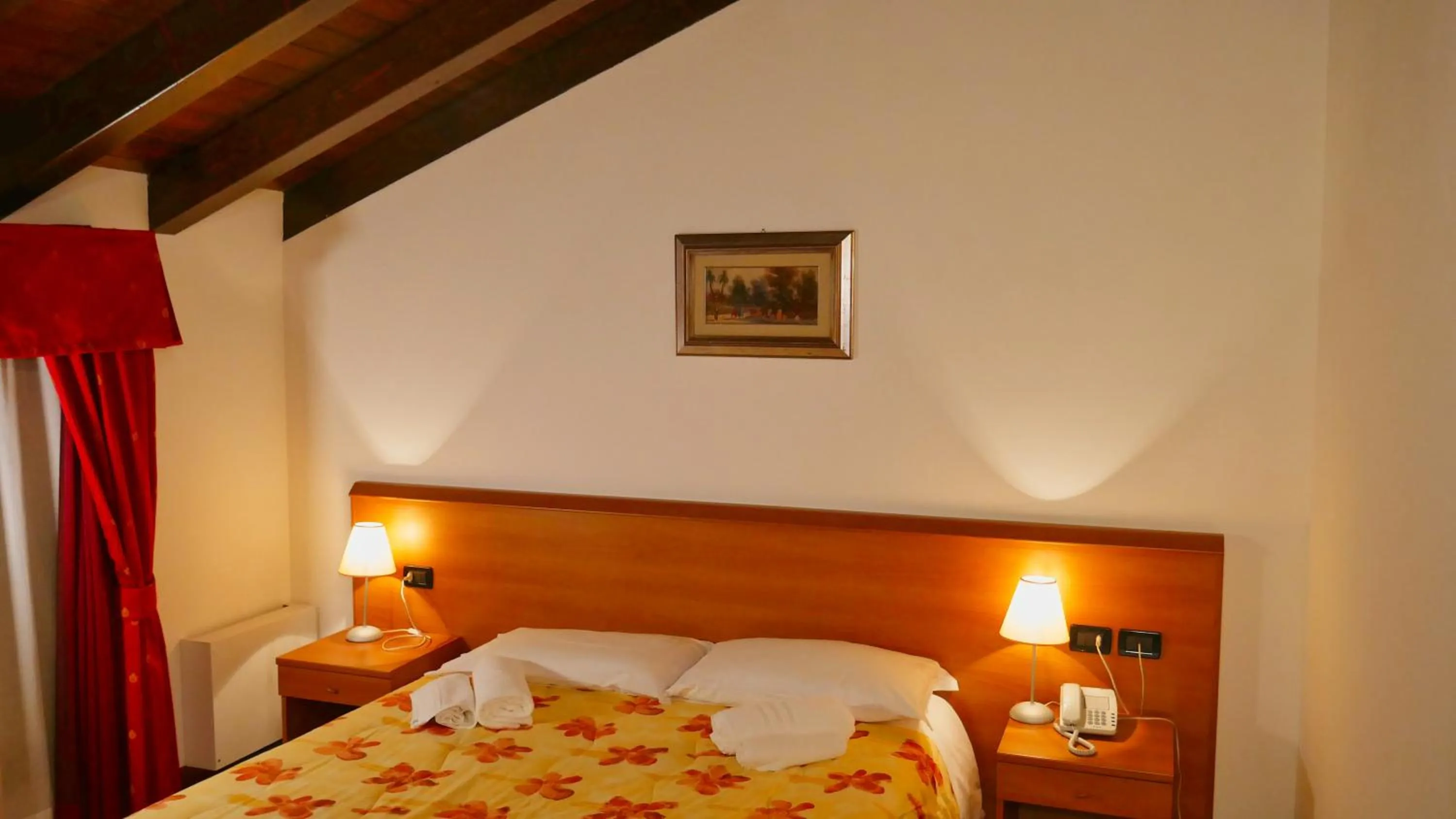 Bed in hotel Vajont