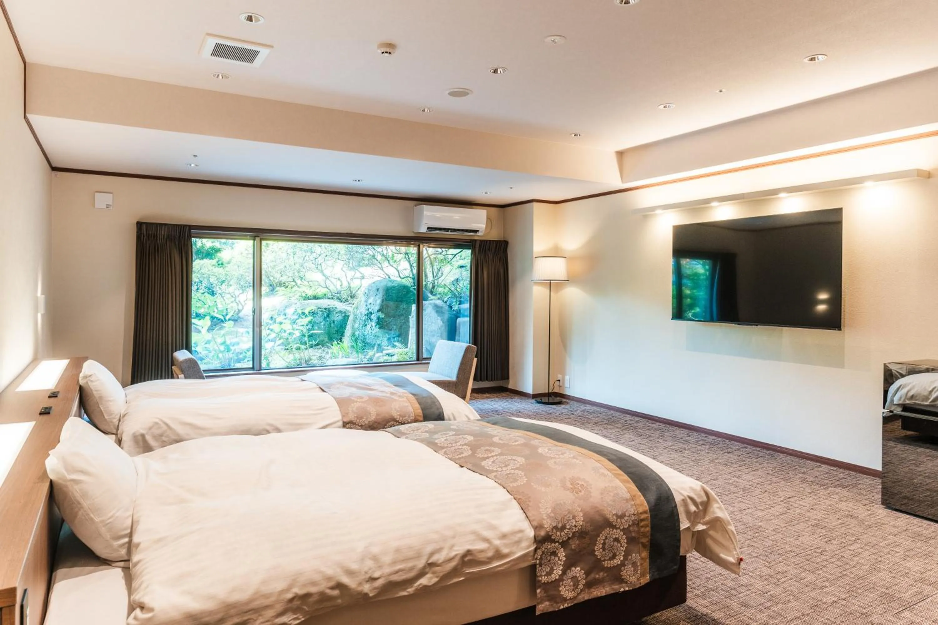 Bed in Tamatsukuri Grand Hotel Choseikaku