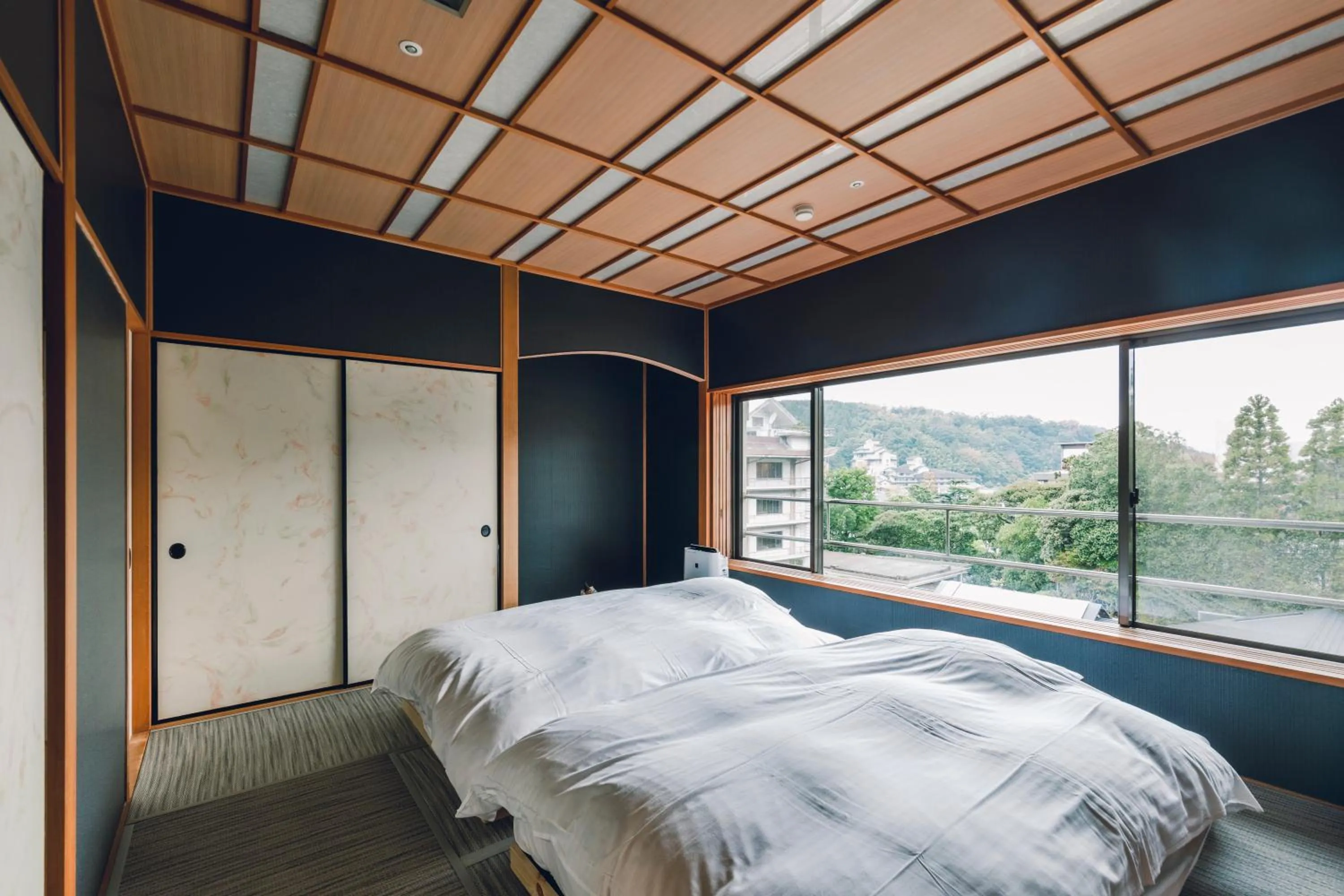 Bed in Tamatsukuri Grand Hotel Choseikaku