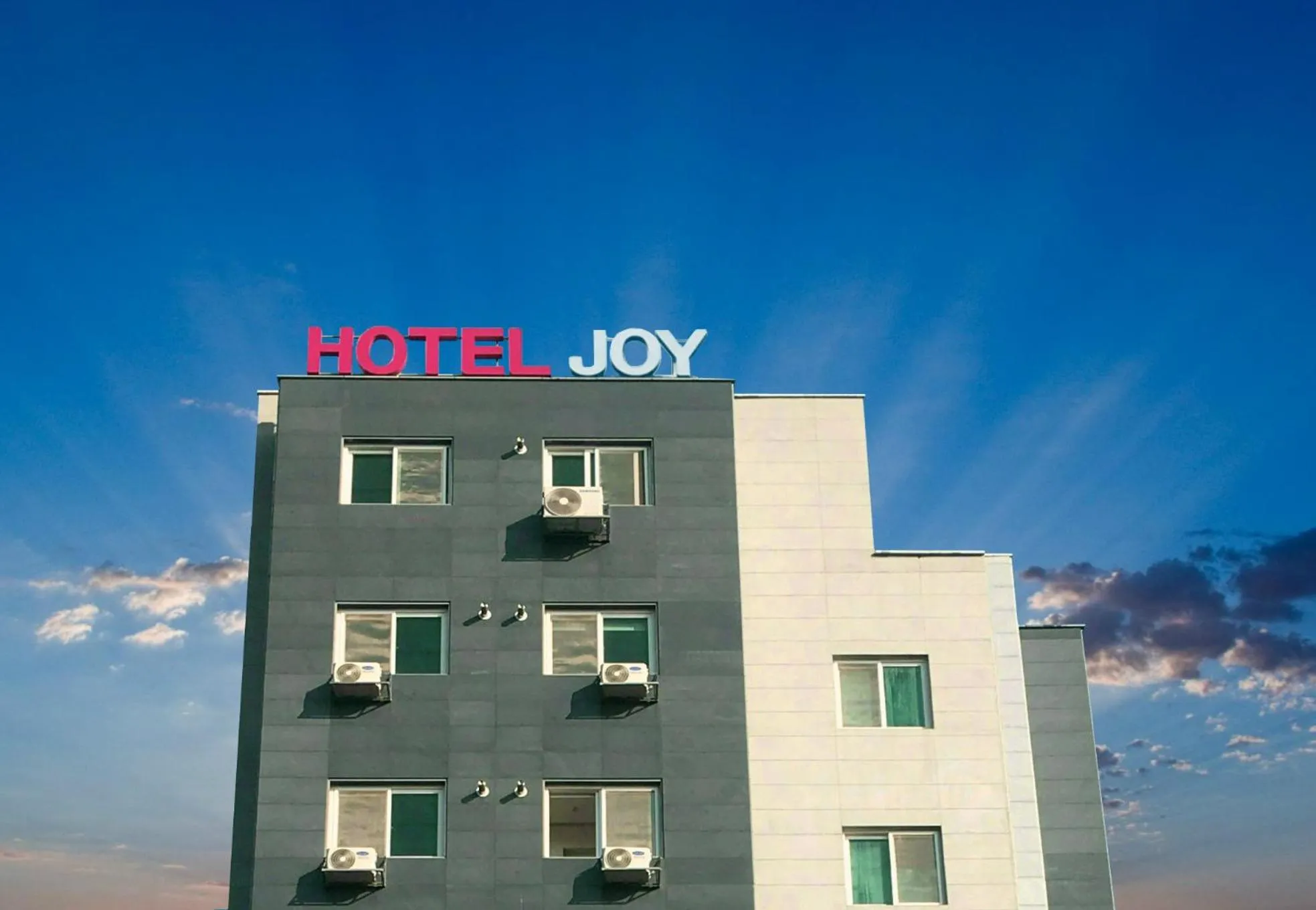 Property building in Hotel Joy near Camp Humphres