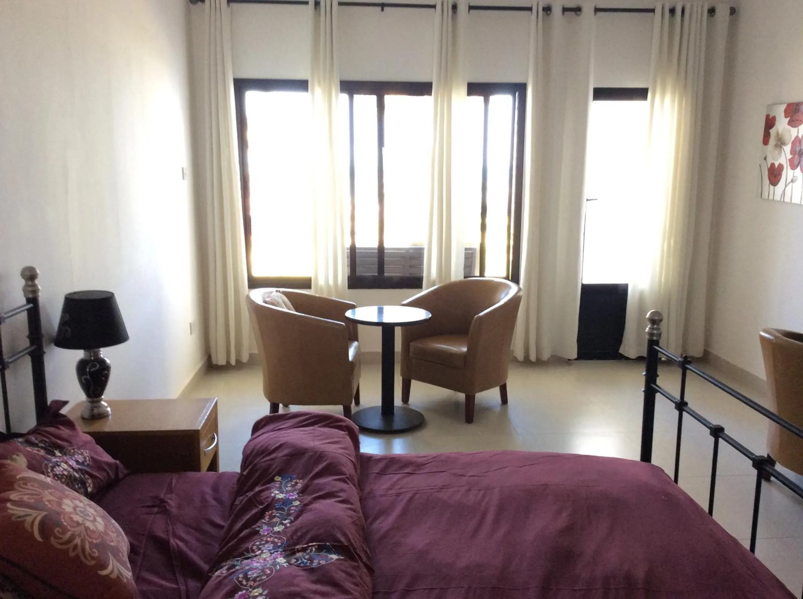 Seating area, Bed in Swiss Boutique Hotel