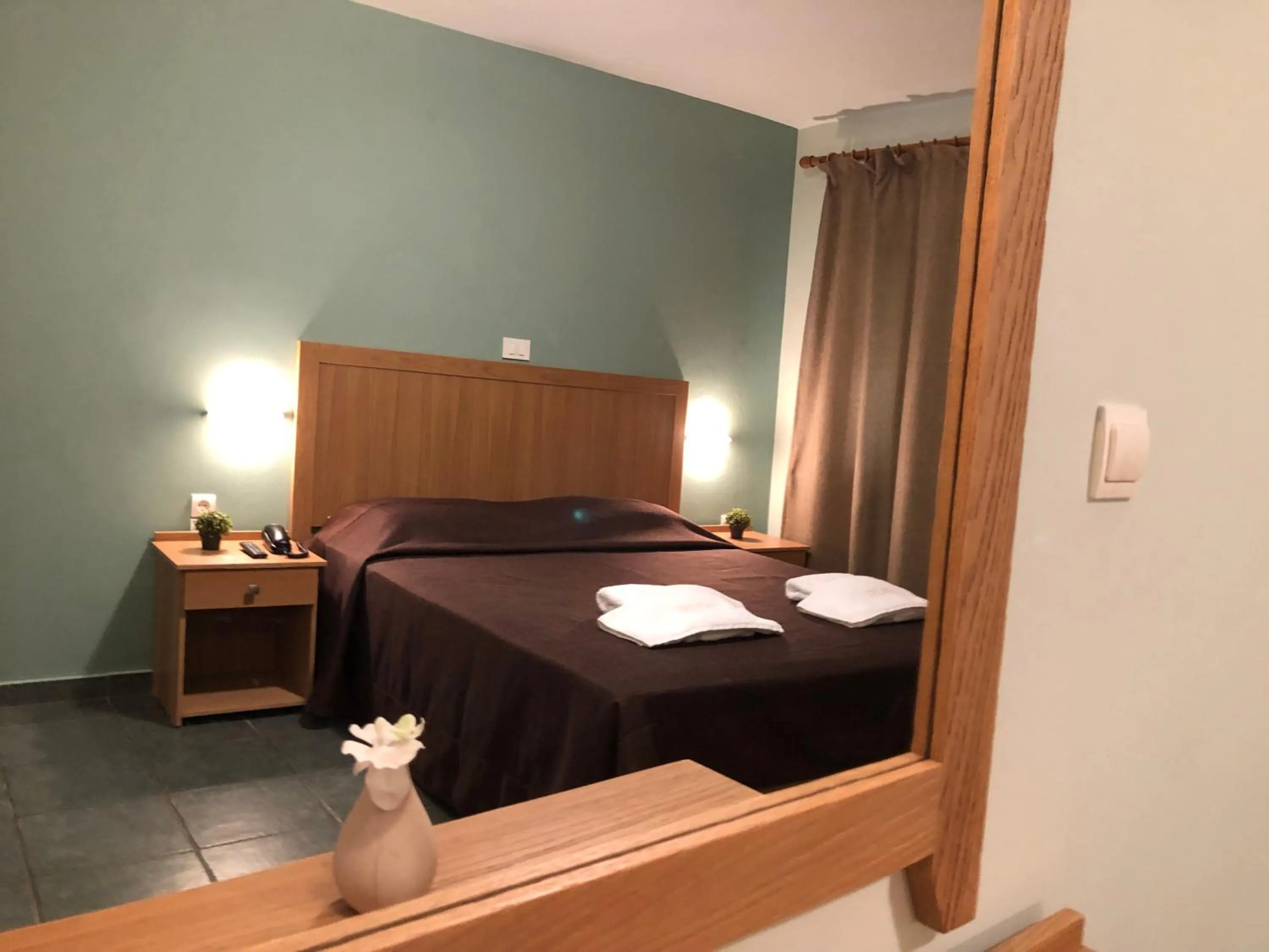 Bed in Mirtilos Studios & Apartments