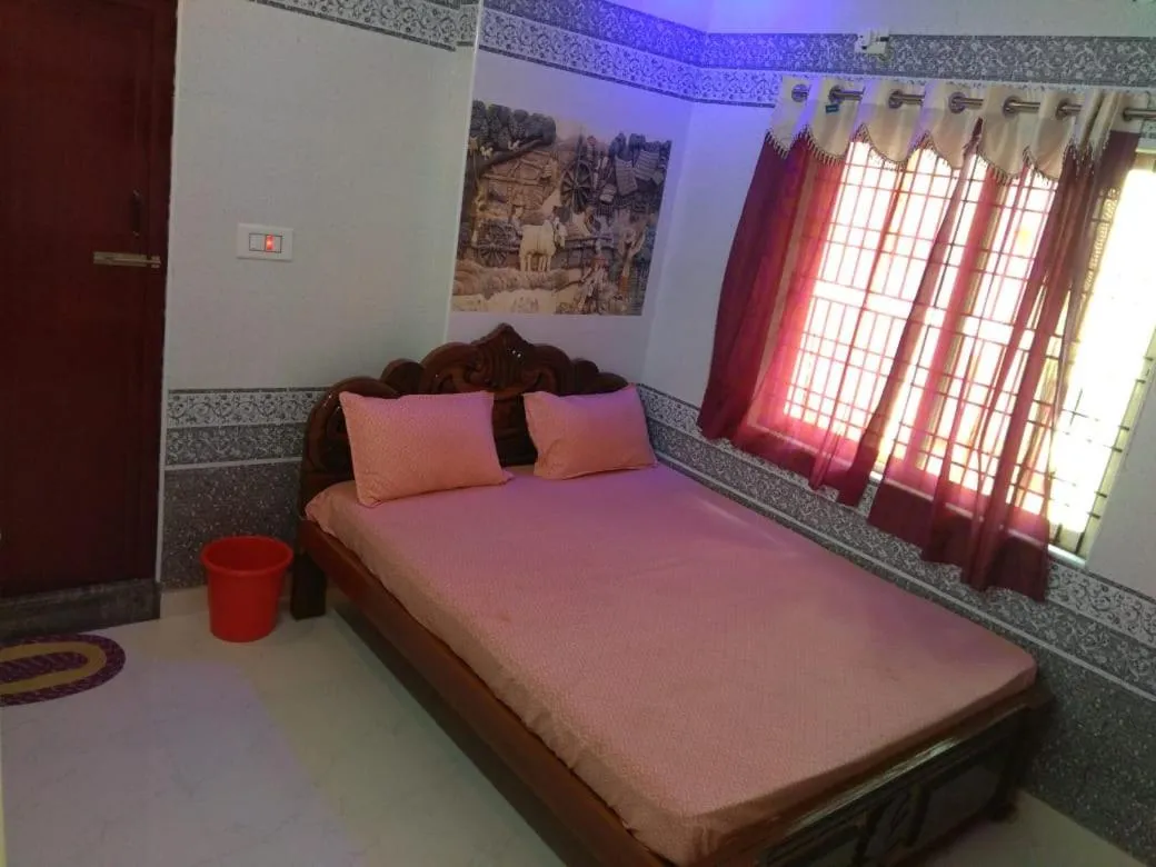 Bed in Sri Priya Lodge