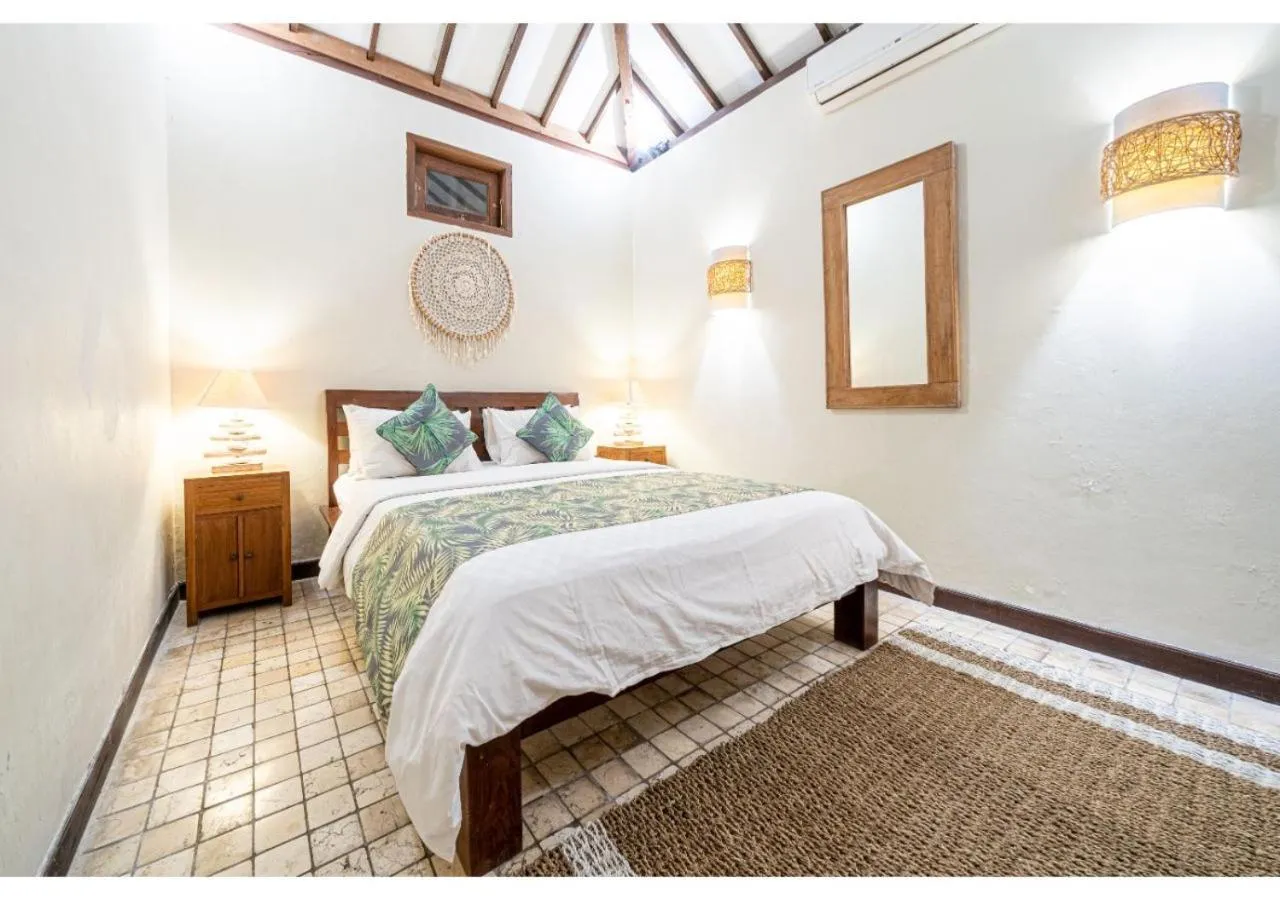 Bed in Tír na nÓg Beachfront Resort