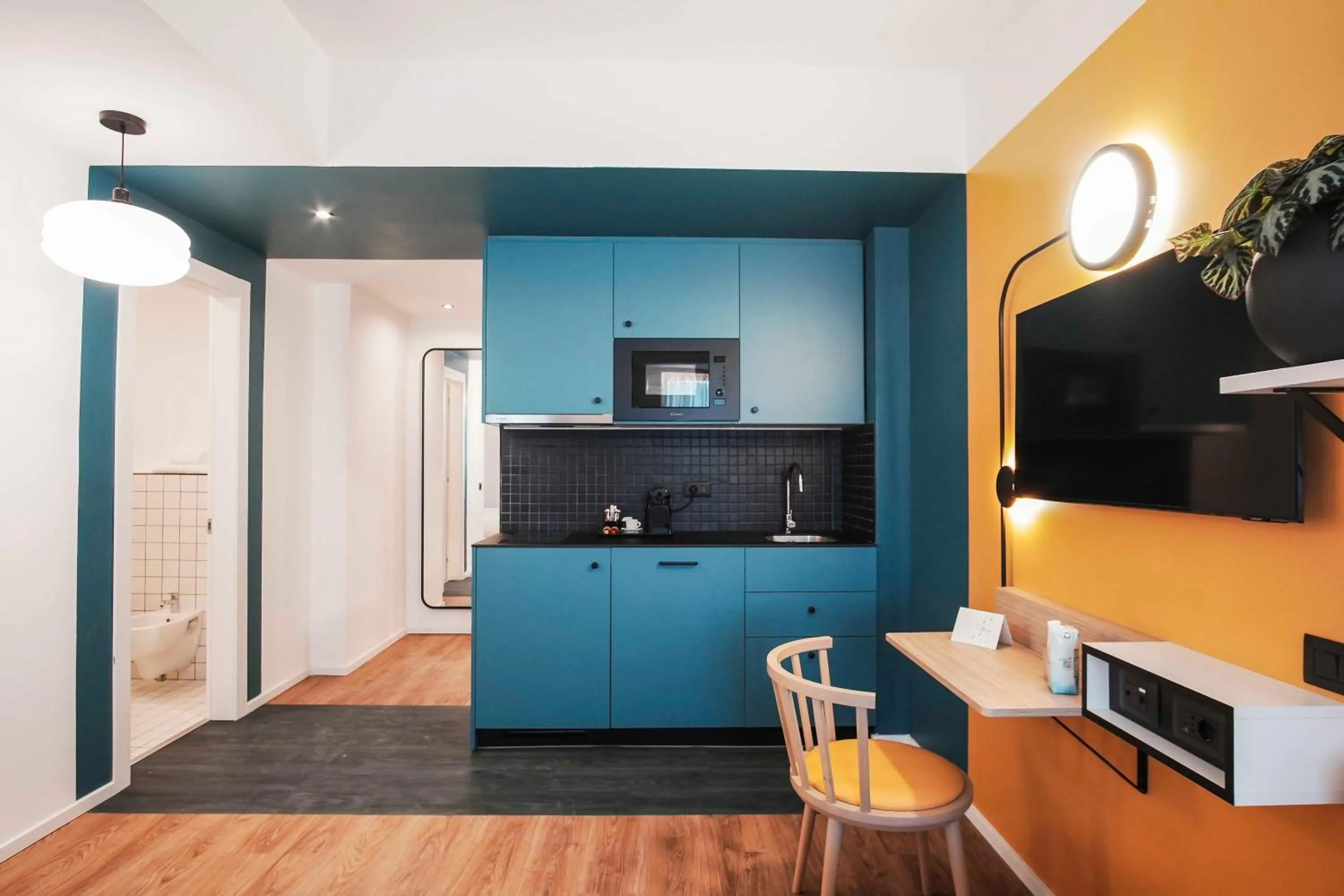 Kitchen or kitchenette in Aparthotel Colombo Roma